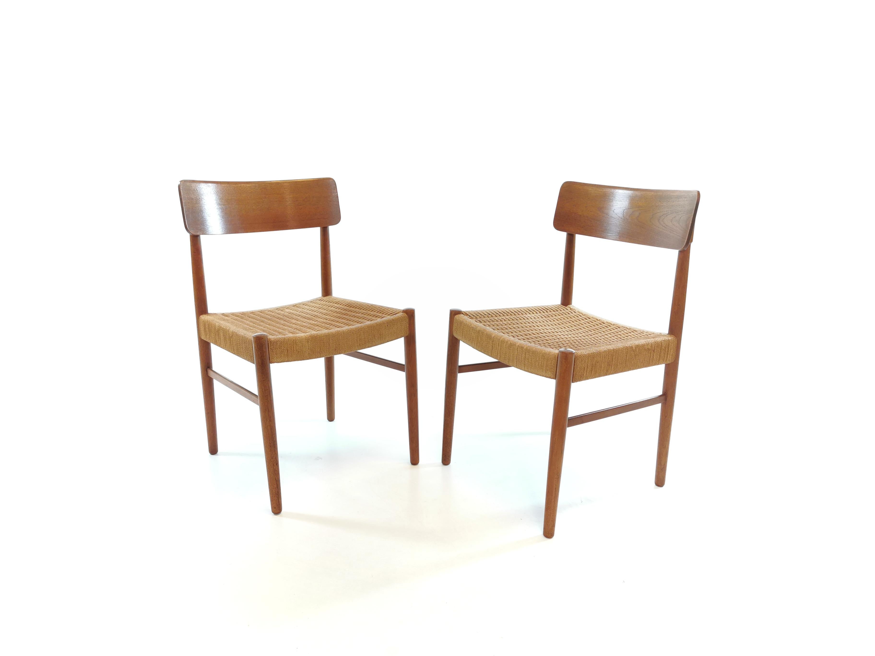 Two Danish paper cord chairs.

1960s. Teak and paper cord.

Very good condition. Structurally sound.