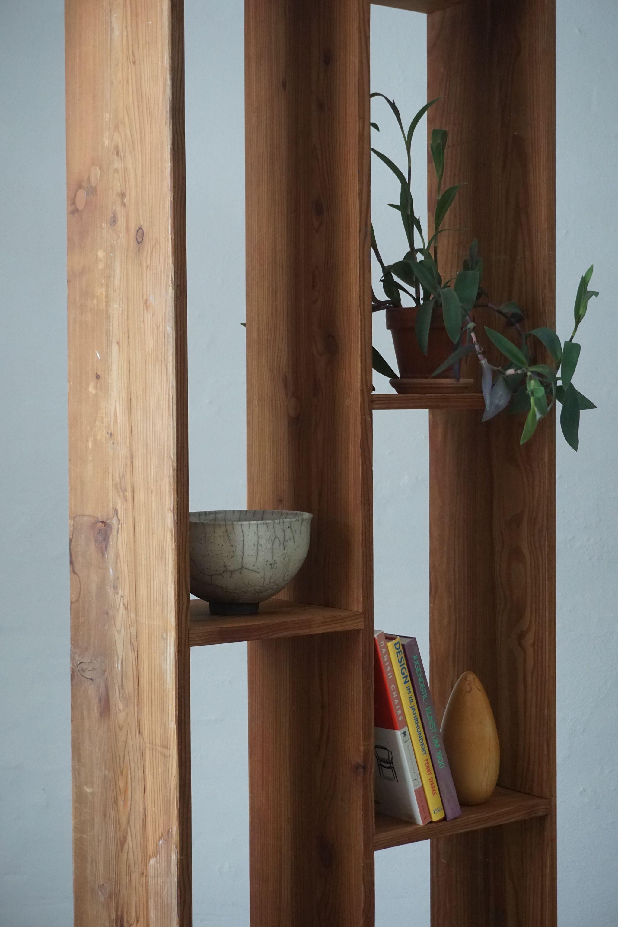 Danish vintage room divider/shelve in pine, 1970s.
Nicely patinated. A sculptural furniture.

Honorable mentions in similar style include Roland Wilhelmsson, Pierre Chapo, and Axel Einar Hjorth.