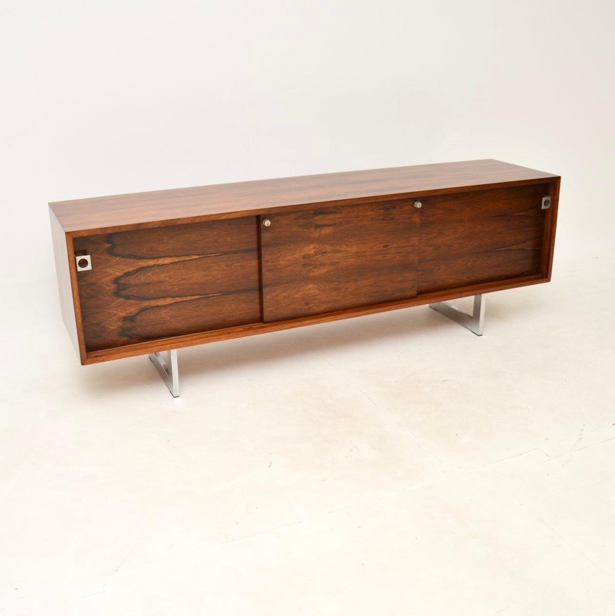 A stunning and extremely rare Danish vintage sideboard by Bodil Kjaer. This was designed in 1959 as part of a whole office range, this piece dates from the 1960’s. It was made in Denmark by E. Pedersen & Søn.

The quality is outstanding, it is a