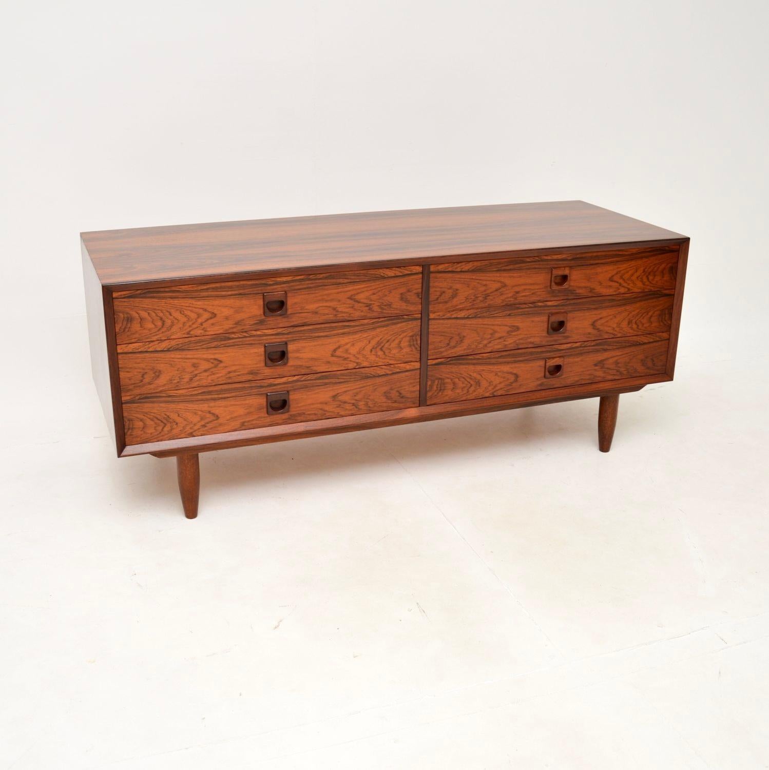 A stunning Danish vintage sideboard / chest of drawers. This was made by Brouer Mobelfabrik in Denmark, it dates from the 1960’s.

The quality is outstanding, this is beautifully crafted and is a very useful size. It is perfect as a low sideboard /