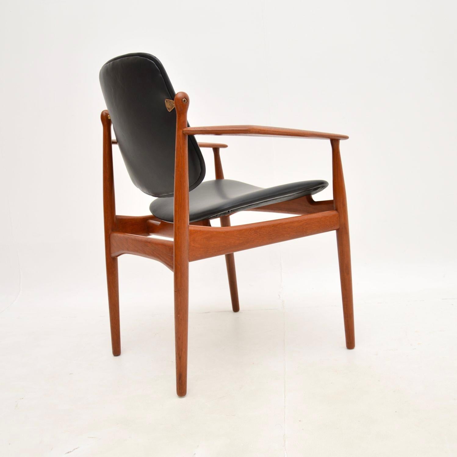 Mid-20th Century Danish Vintage Teak and Leather Armchair by Arne Vodder For Sale