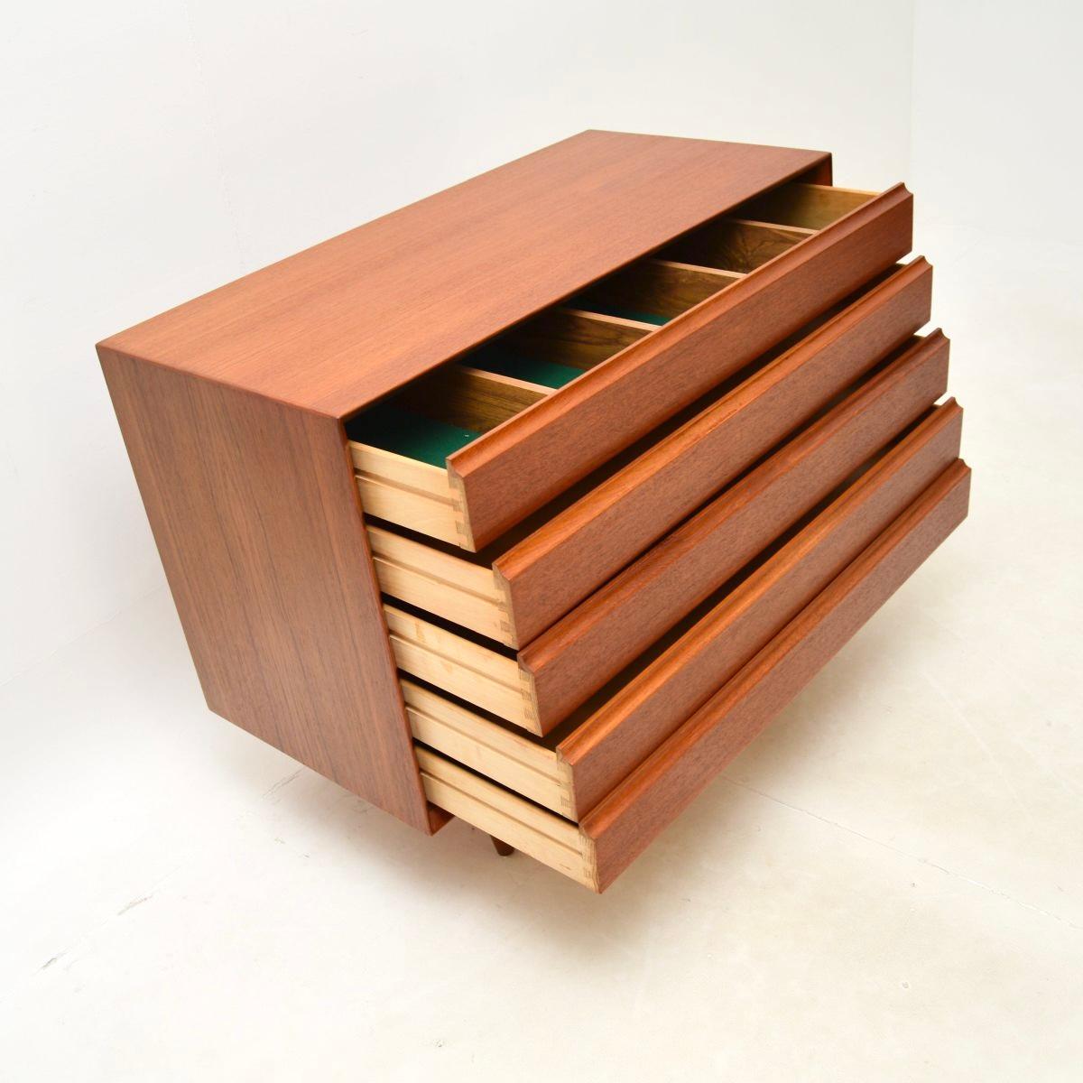 A very stylish and extremely well made Danish vintage teak chest of drawers by Svend Aage Rasmussen. This was made in Denmark, it dates from the 1960’s.

It is of amazing quality, with a beautifully sleek, minimalist design. There is plenty of