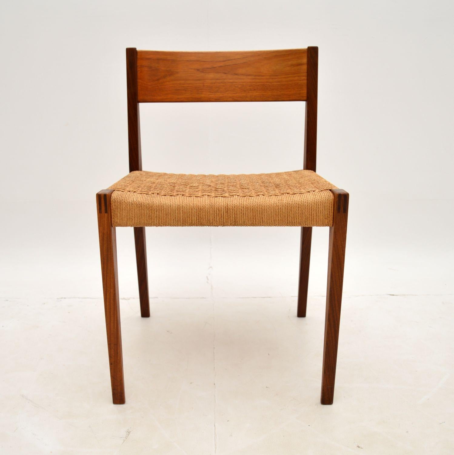 A stylish and iconic vintage Danish chair in Teak. This was designed by Poul Cadovious, it was made in Denmark and dates from the 1960’s.

This is beautifully made and is in great condition for its age. There is just some very light wear here and