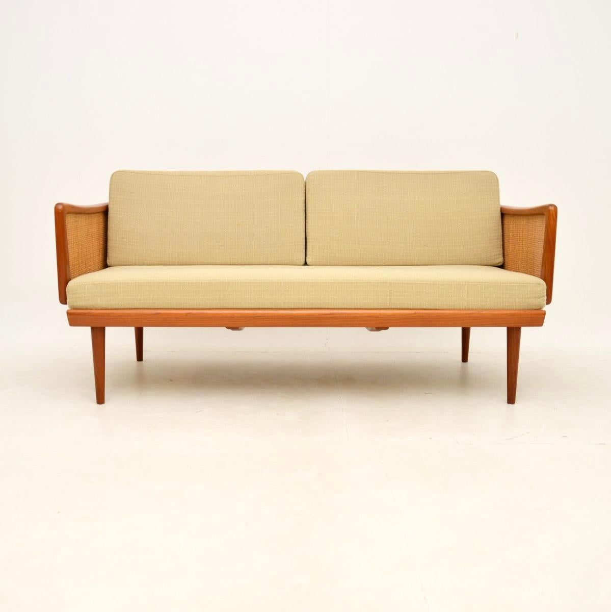 A stunning and very rare Danish vintage teak sofa bed by Peter Hvidt and Orla Mølgaard-Nielsen. This was made in Denmark by France and Son, it dates from the 1960’s.

It is of superb quality and is extremely comfortable with the original thick,