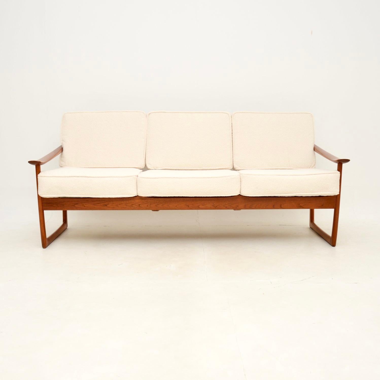A stunning Danish vintage teak sofa by Peter Hvidt and Orla Molgaard Nielsen. This was made in Denmark by France and Son, it dates from the 1960’s.

The quality is outstanding, this is incredibly well designed, comfortable and stylish. The solid