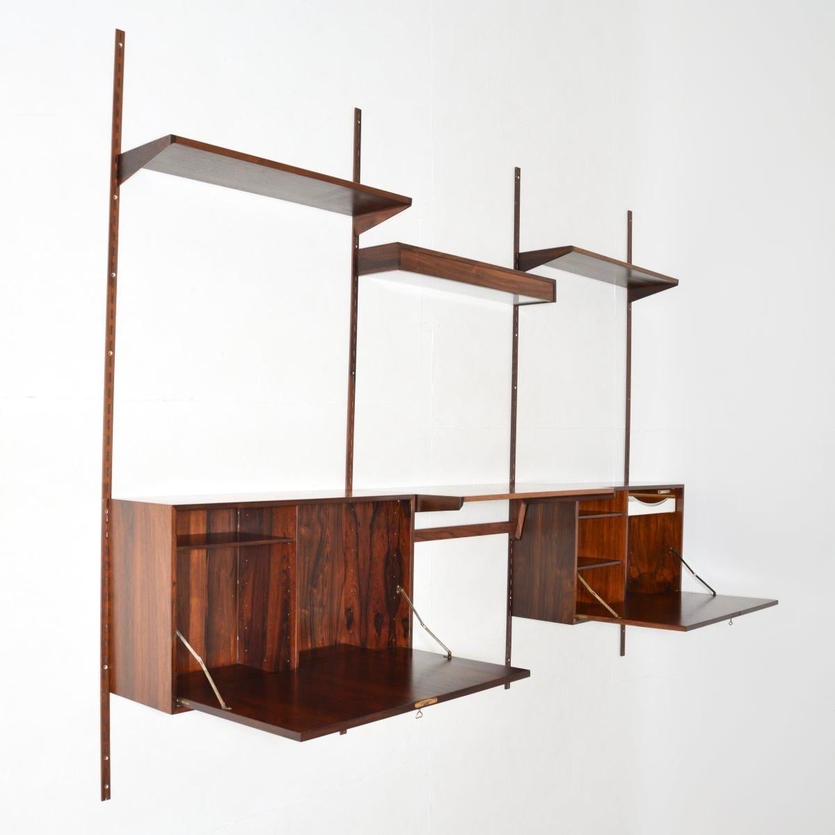 A superb Danish vintage wall mounting shelving system by Kai Kristiansen. This was made in Denmark by FM Mobler, it dates from the 1960’s.

This ingenious shelving system is very stylish, versatile and of amazing quality. It consists of three