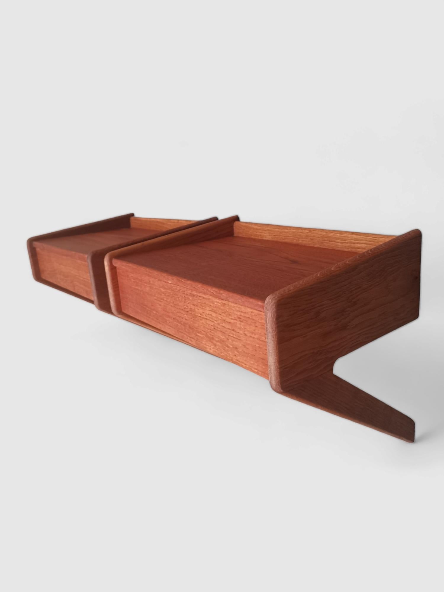 Classic Danish Wall Mounted Teak Bedside Tables From the 60s, With One drawer in each nightstand,  so you can store away, and keep your space organized and clutter-free.
These Danish bedside tables is characterized by clean lines, minimalistic