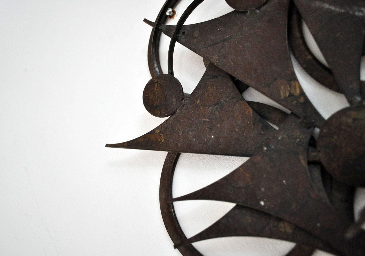 Wall sculpture in metal by Henrik Horst, Denmark, 1970s.
Cut steel with lacquered and acid treated finish.

Good condition with signs of age and patination.