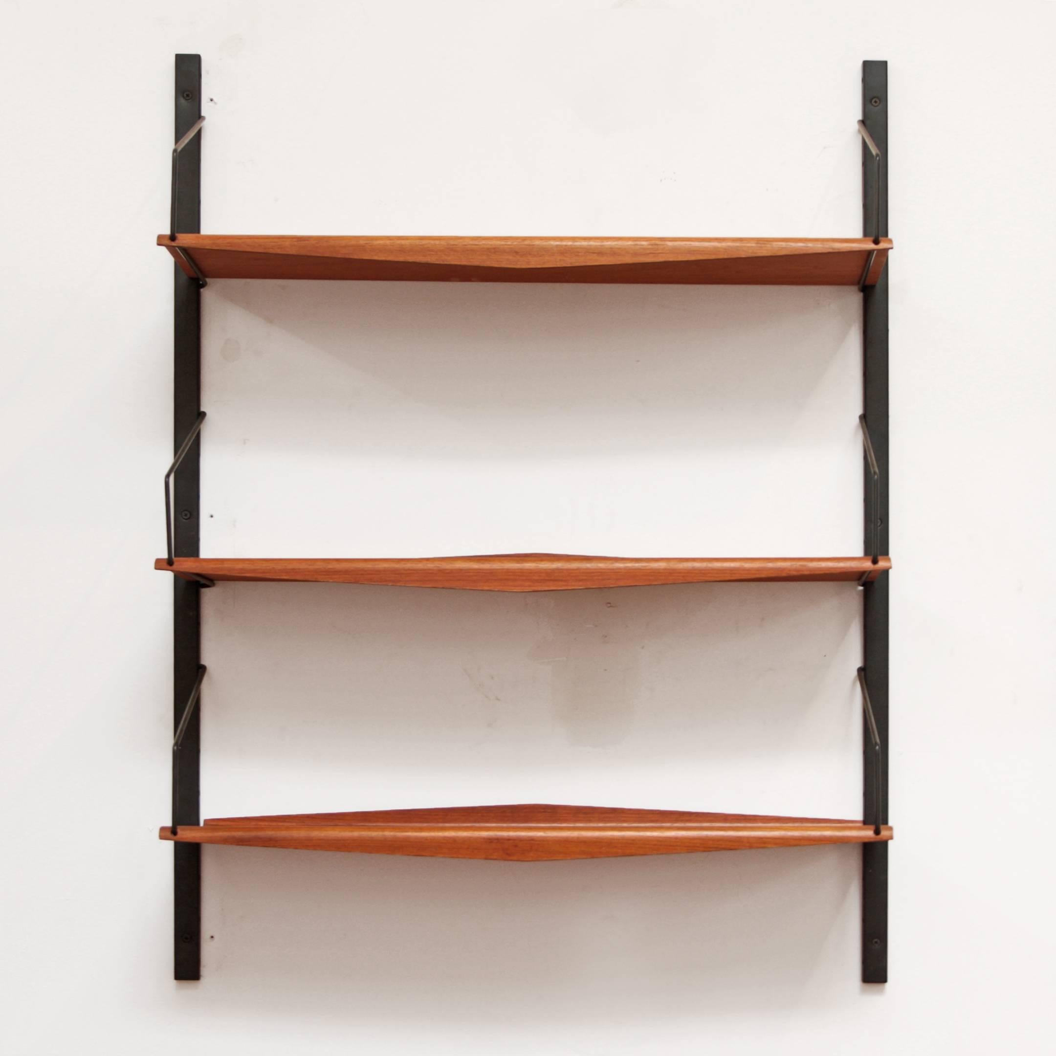Danish Modern wall unit or bookshelf with curved teak shelves and metal hardware. Shelves are adjustable in height along the slots in rails.