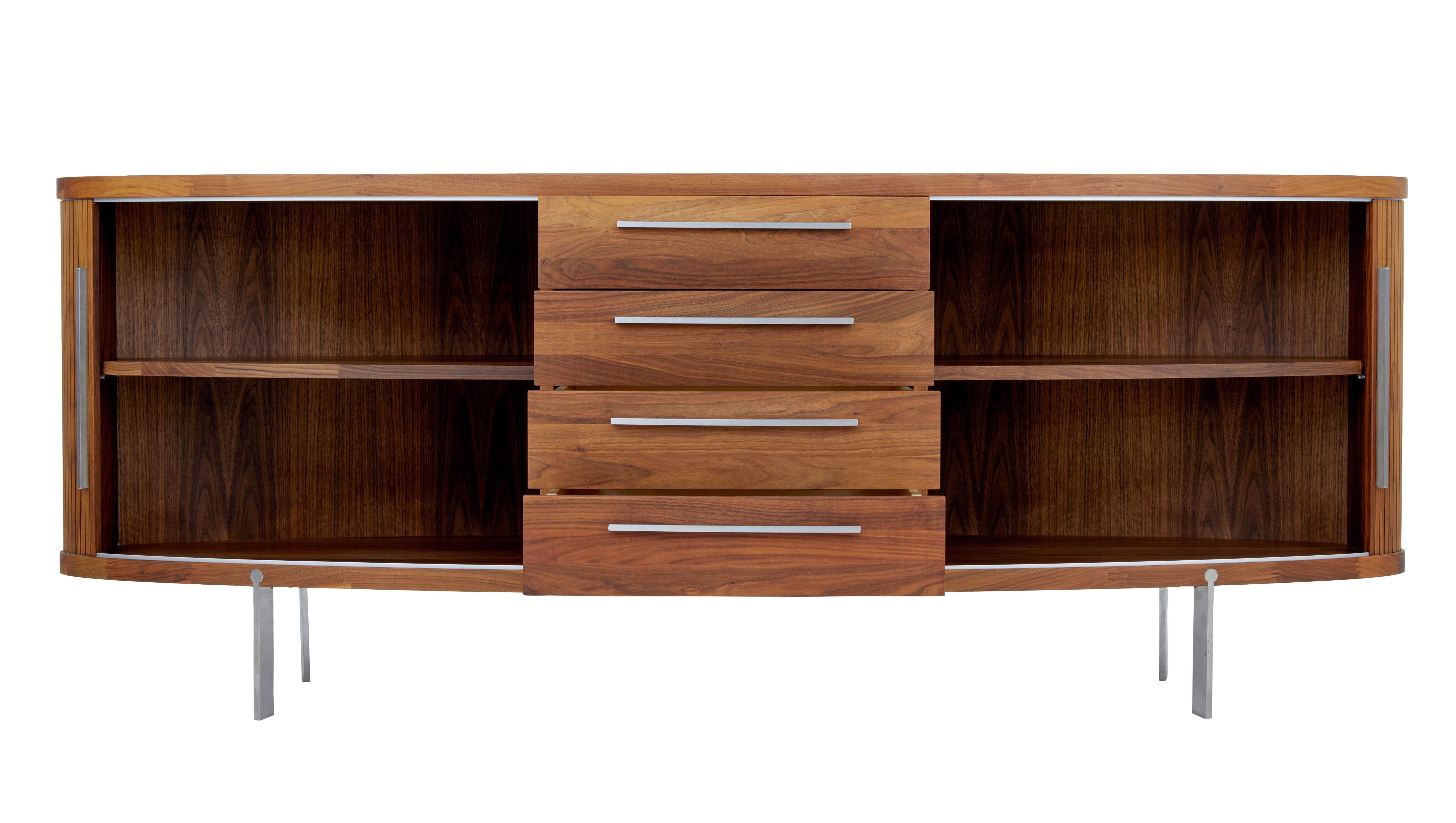 Fine quality piece of 21st century design from the Naver collection circa 2010.

Designed by Soren Nissen and Ebbe Gehl this oval shaped sideboard is a real modern classic. A central bank of 4 drawers with brushed steel handles is flanked either