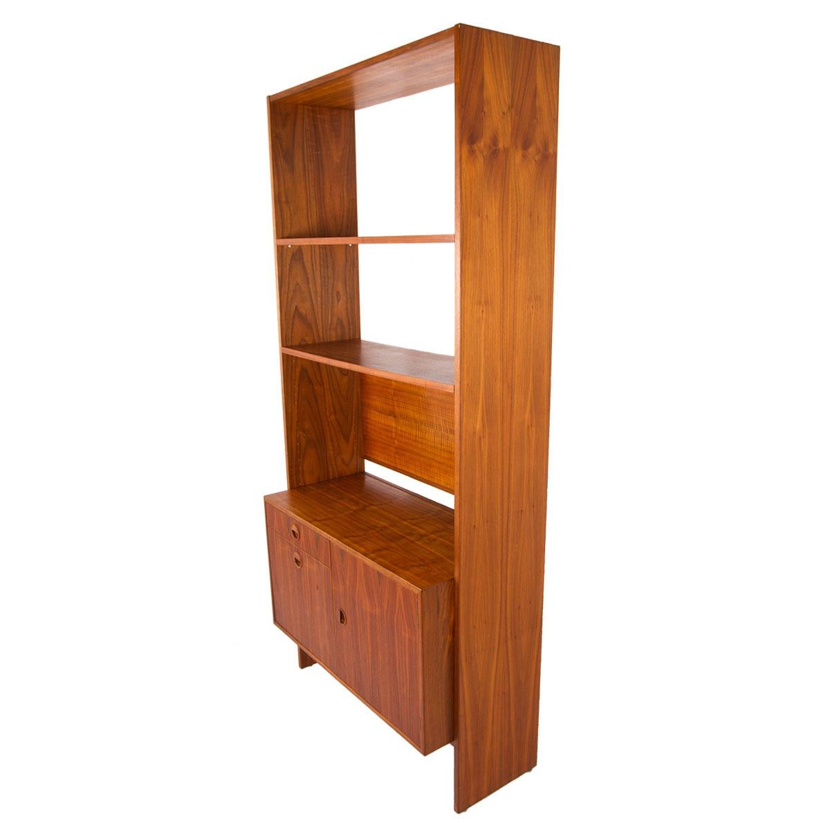 Danish Walnut Stand Alone Wall Unit / Room Divider / Bookshelf

Additional information:
Material: Walnut
Featured at DC
Gorgeous honey-toned walnut that would certainly play well w/ teak. Drawers below conceal storage w/ an adjustable shelf,