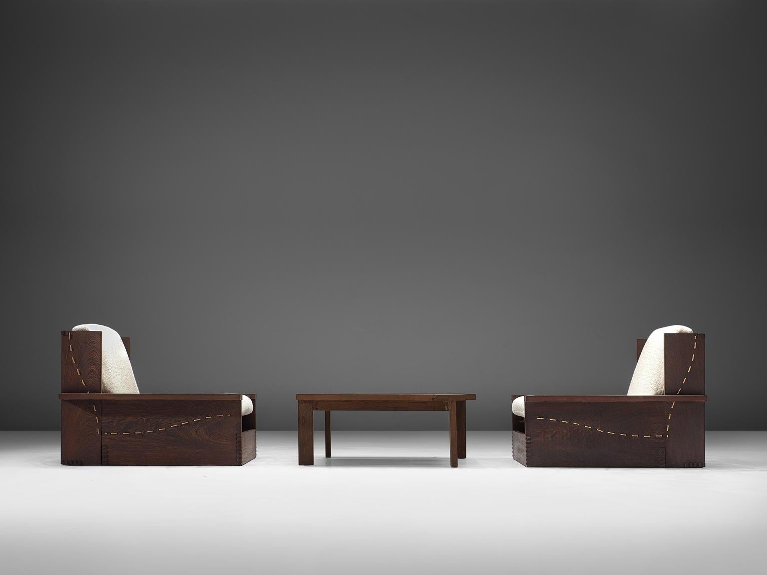 Lounge chairs and coffee table, wenge and white wool, Denmark, 1960s-1970s.

This modest, simplistic set of wengé chairs has a very robust yet detailed details. The cushions are reupholstered with a thick white woollen Pierre Frey. The design of