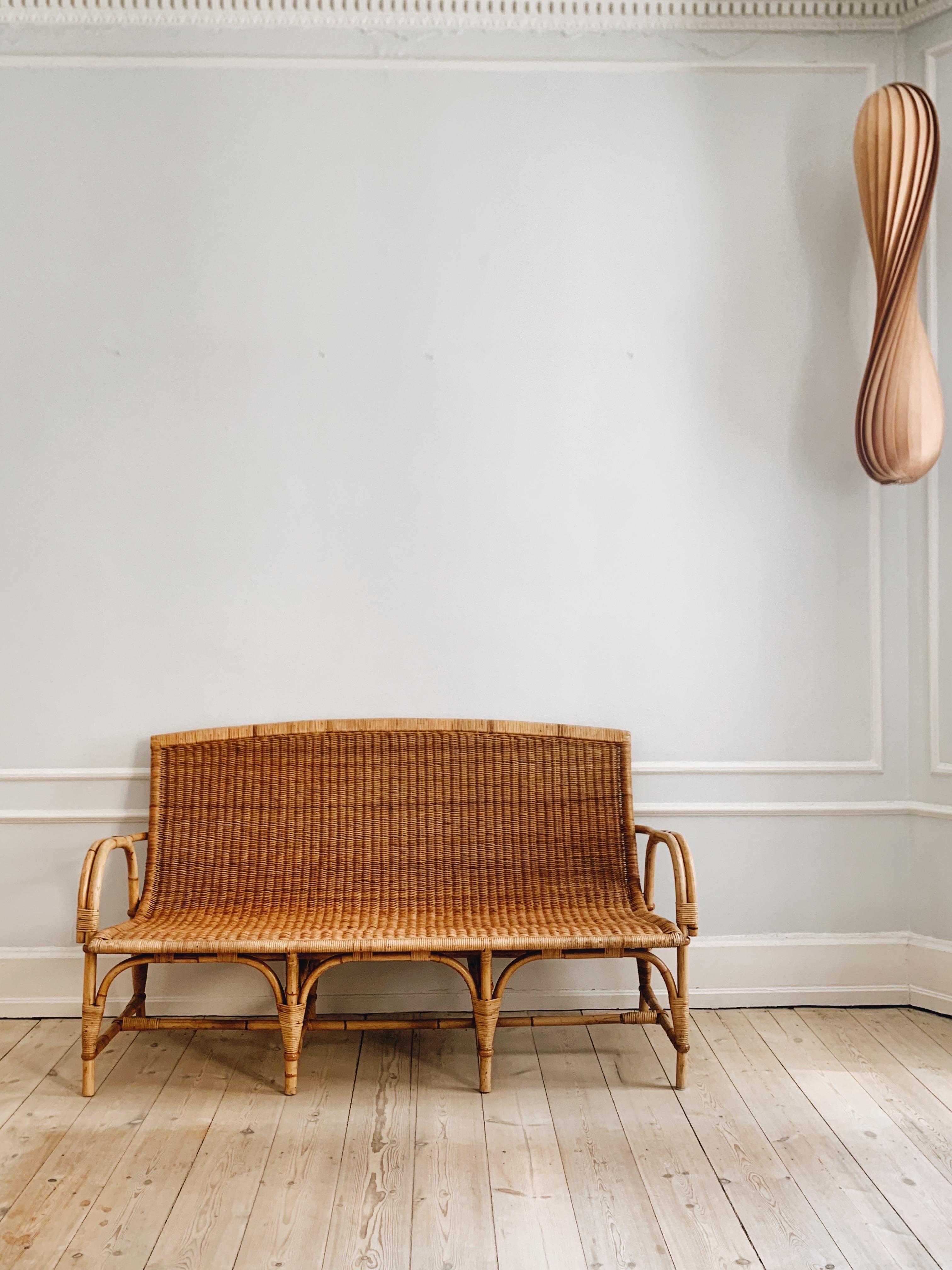 

This wicker bench is made by the old Danish basket makers and bears witness to top-class craftsmanship. A craft and furniture tradition that no longer exists. 

The is attributed to Robert Wengler, who was the finest basket maker in old