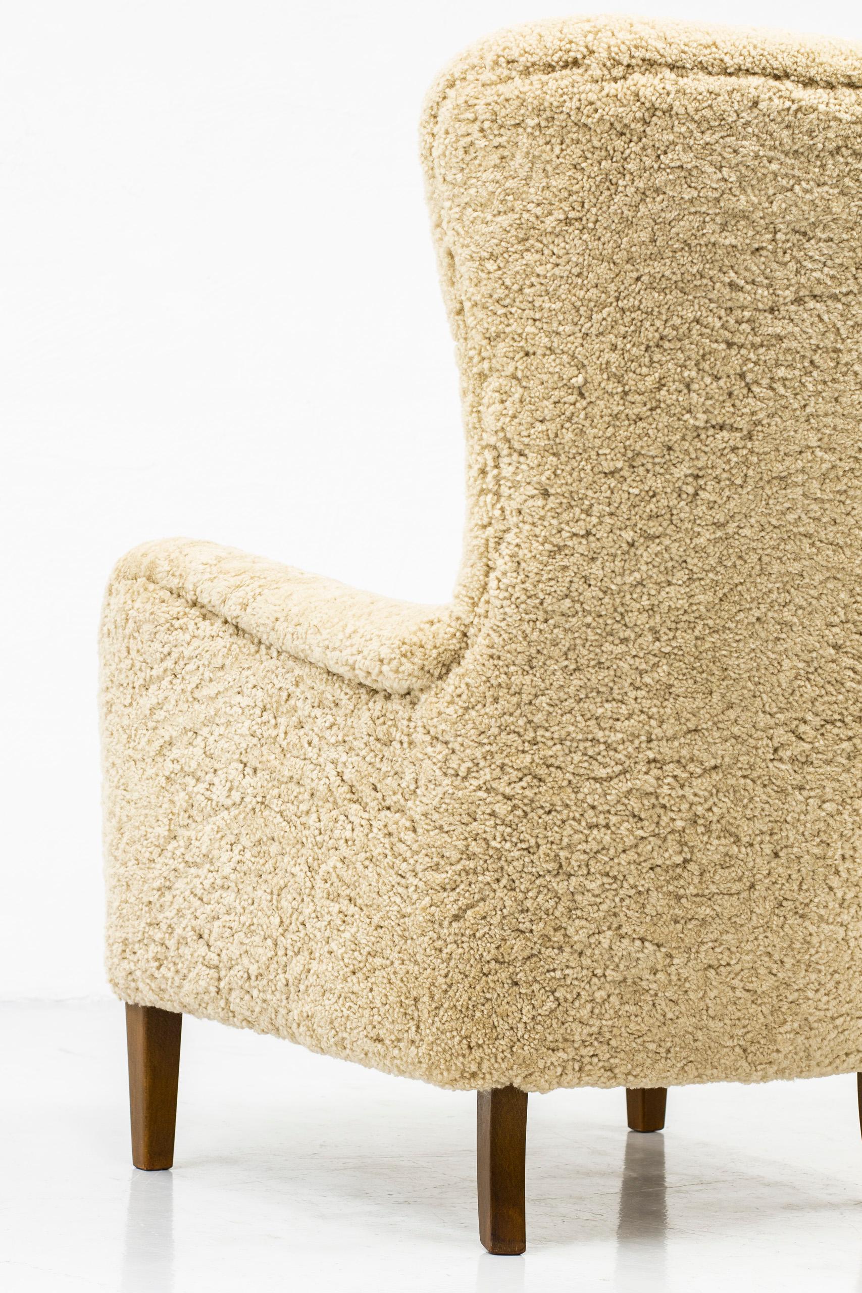 Danish Wing Back Chair with Sheep Skin in the Manner of Frits Henningsen 4