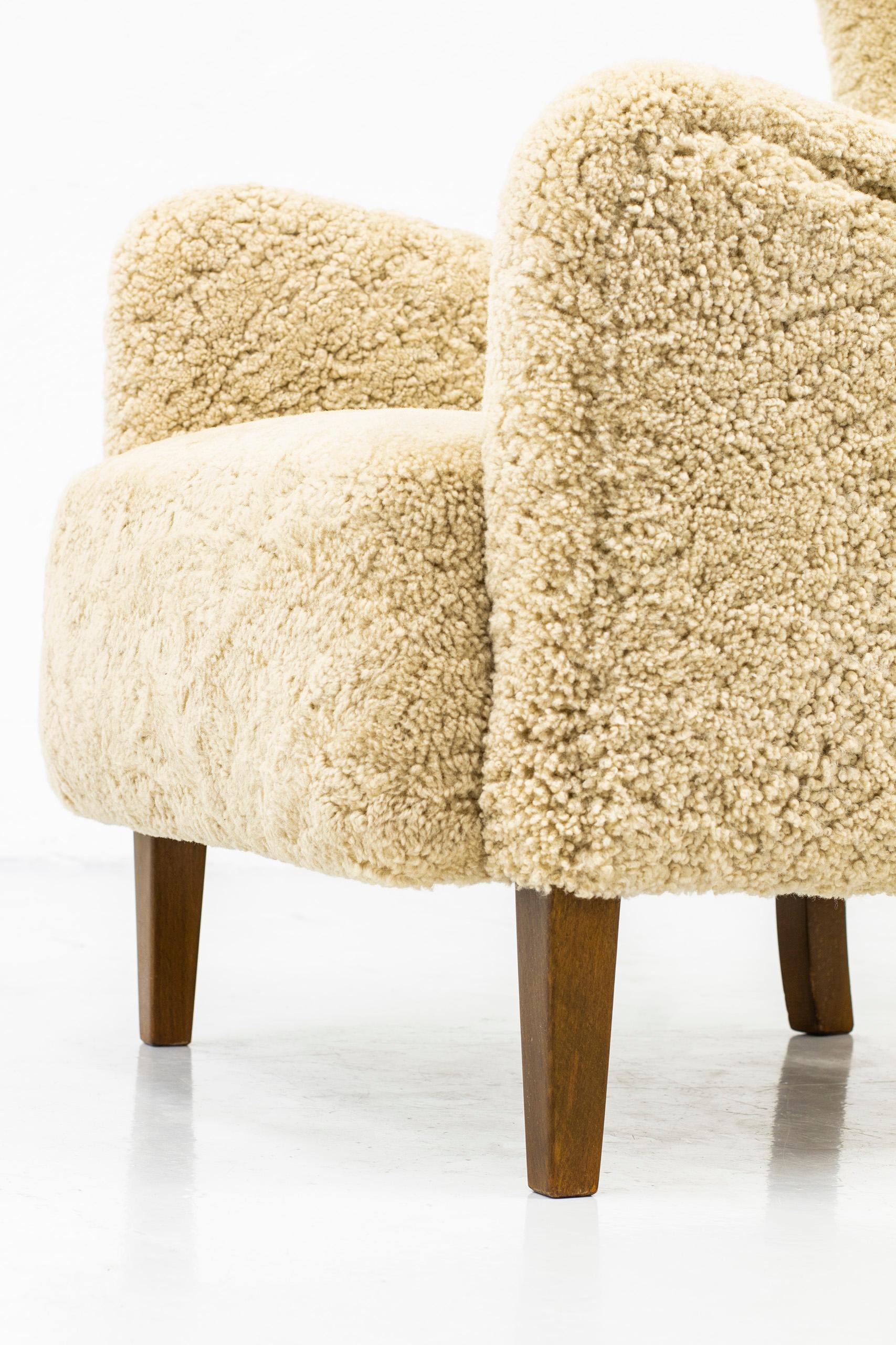 Danish Wing Back Chair with Sheep Skin in the Manner of Frits Henningsen 6
