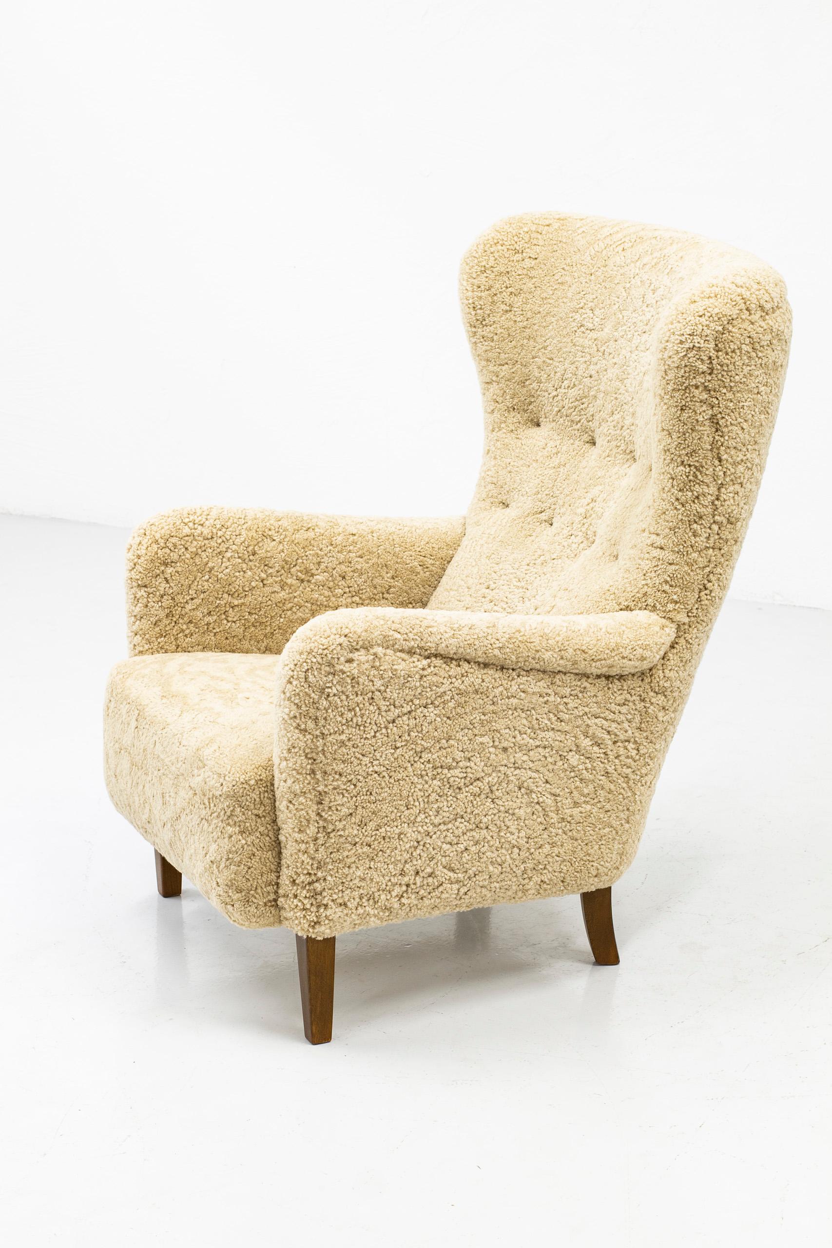 Sheepskin Danish Wing Back Chair with Sheep Skin in the Manner of Frits Henningsen