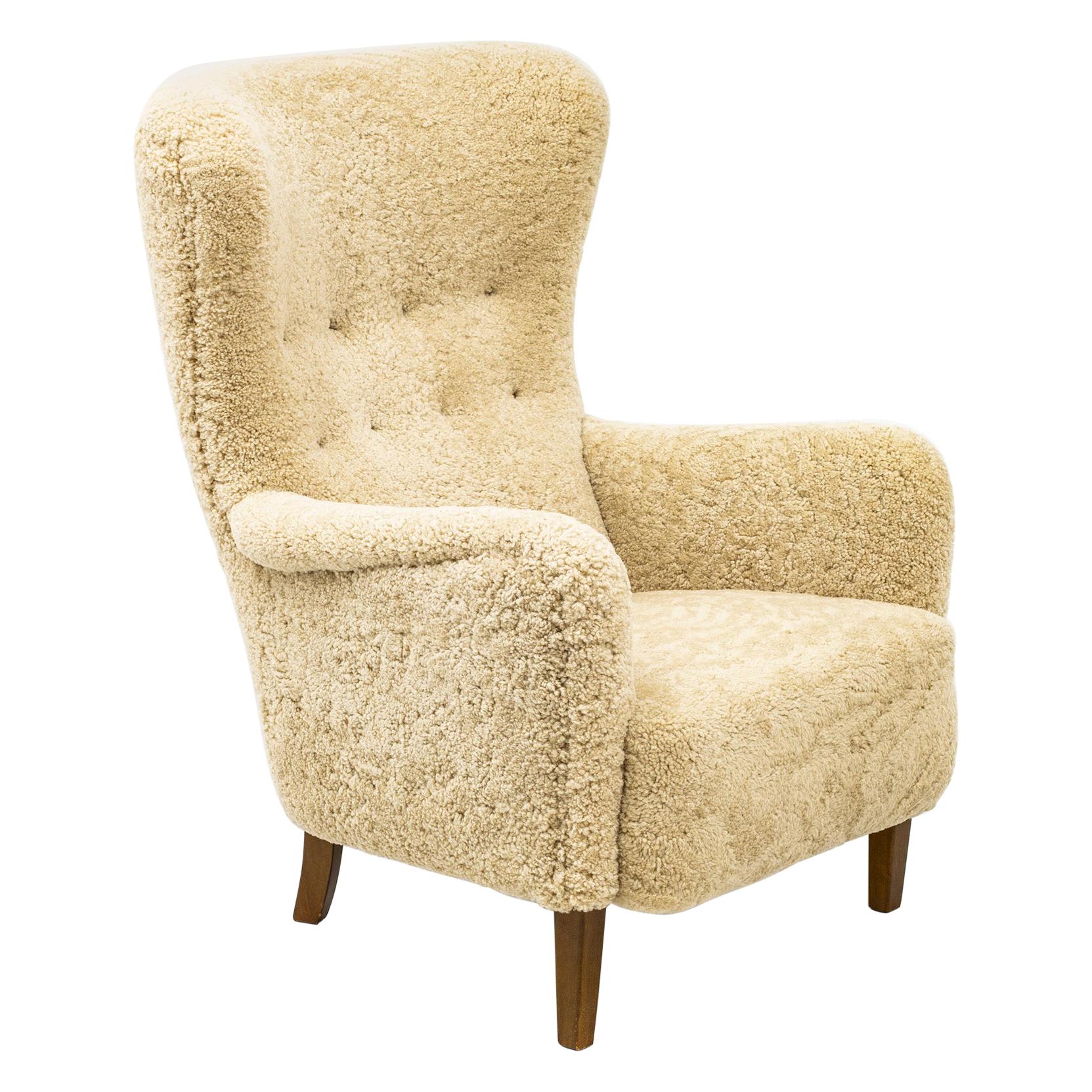 Danish Wing Back Chair with Sheep Skin in the Manner of Frits Henningsen