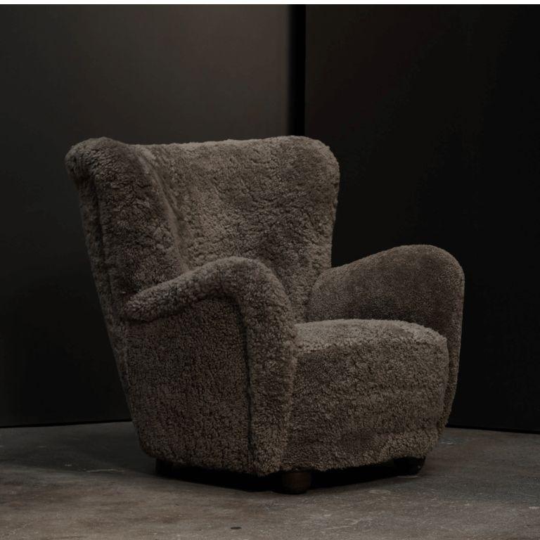 Materials: Mushroom Shearling
Origin: Denmark
Dimensions: 36” W X 40” D X 37.5” H, SH 17, AH 24
Quantity: 1 Available
One of a kind and antique

At STUDIO BALESTRA, we curate a unique collection of antique and handcrafted furniture. Our skilled