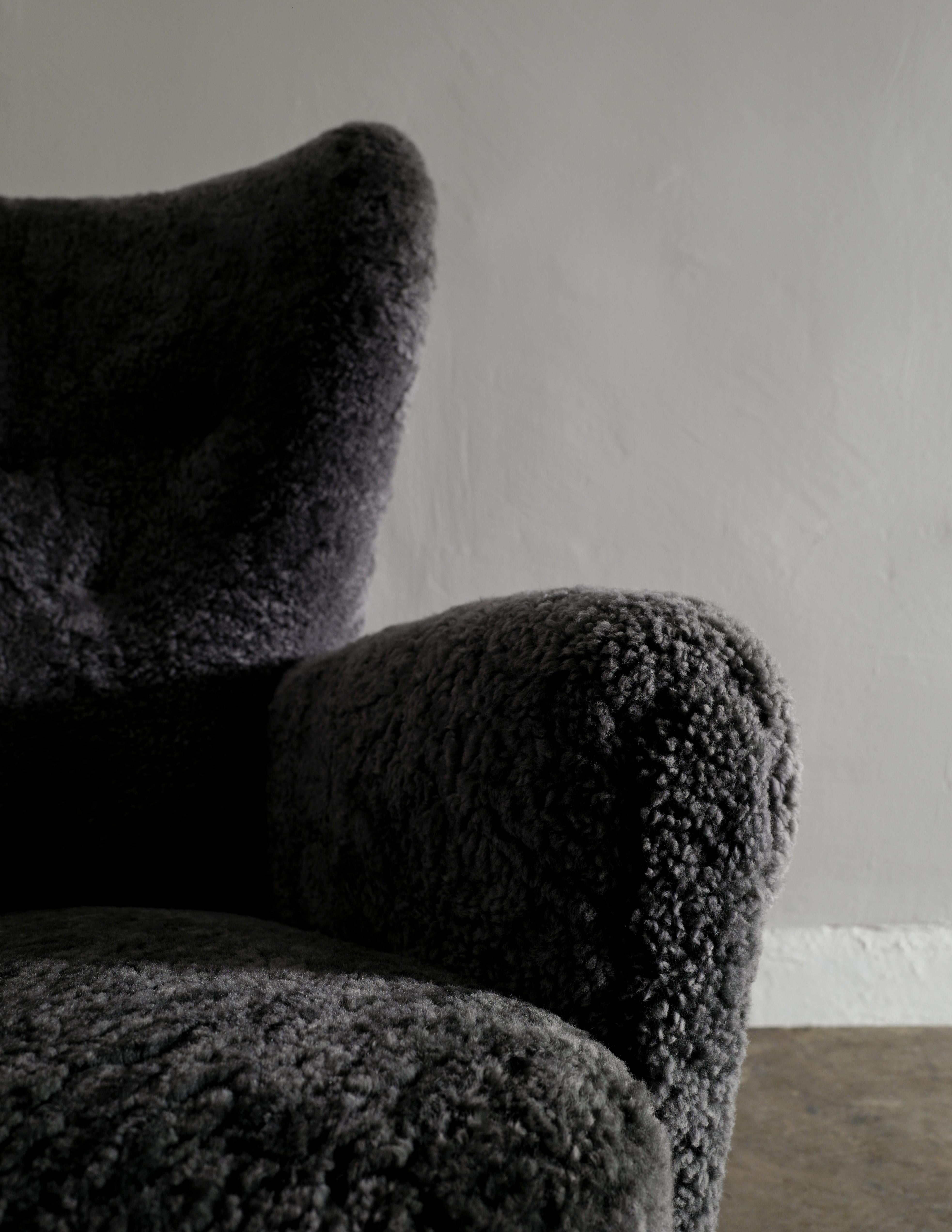 Mid-20th Century Danish Wingback Arm Chair in Dark Grey Sheepskin Produced in Denmark ca 1940s