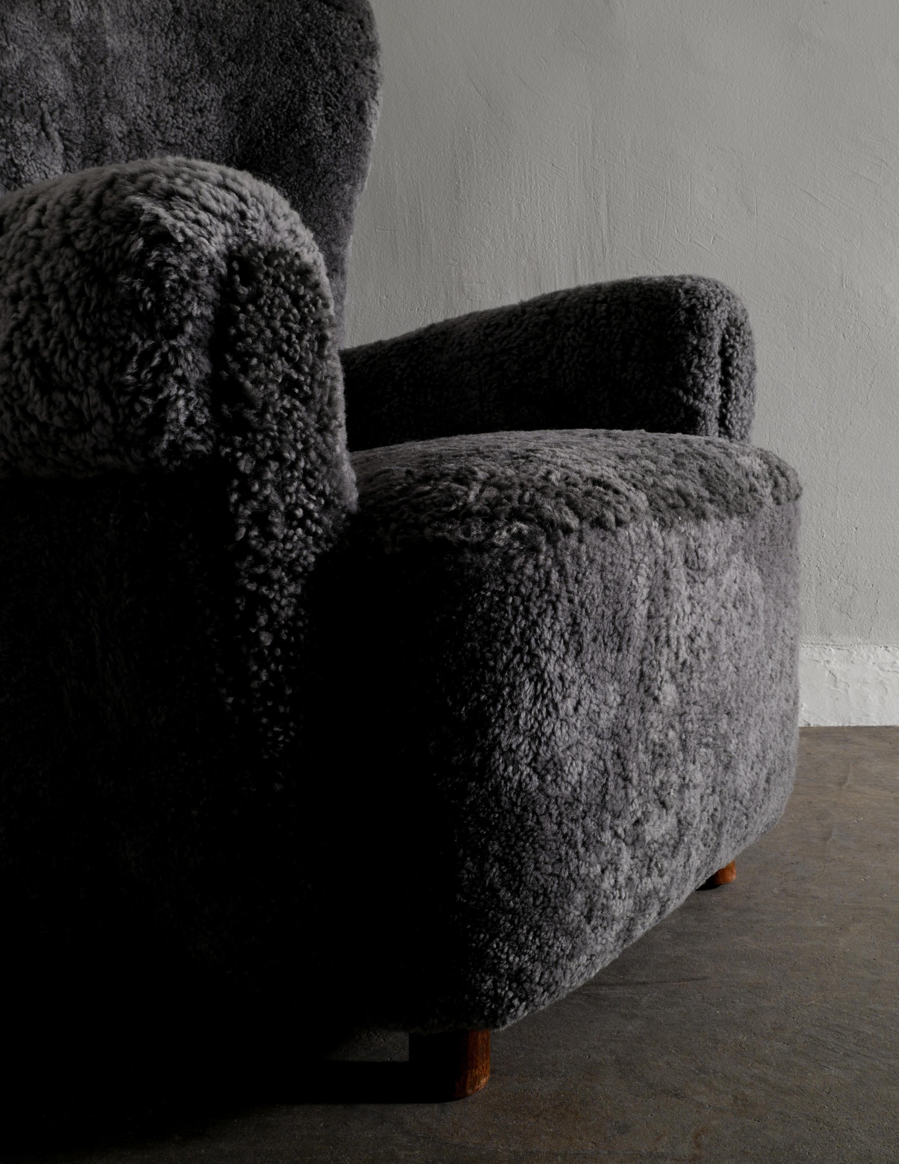 Danish Wingback Arm Chair in Dark Grey Sheepskin Produced in Denmark ca 1940s 2