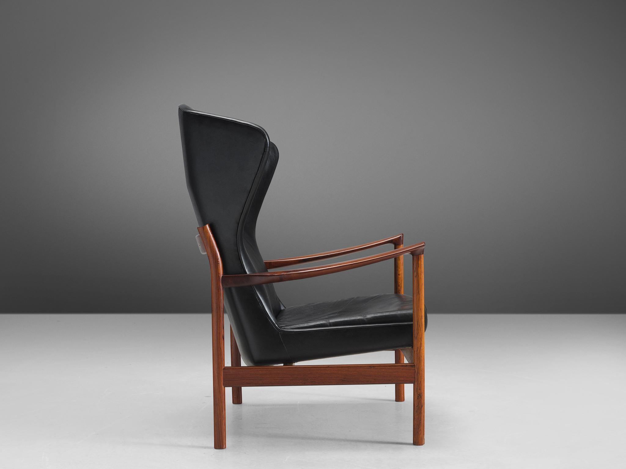 Mid-20th Century Danish Wingback Chair in Rosewood and Leather