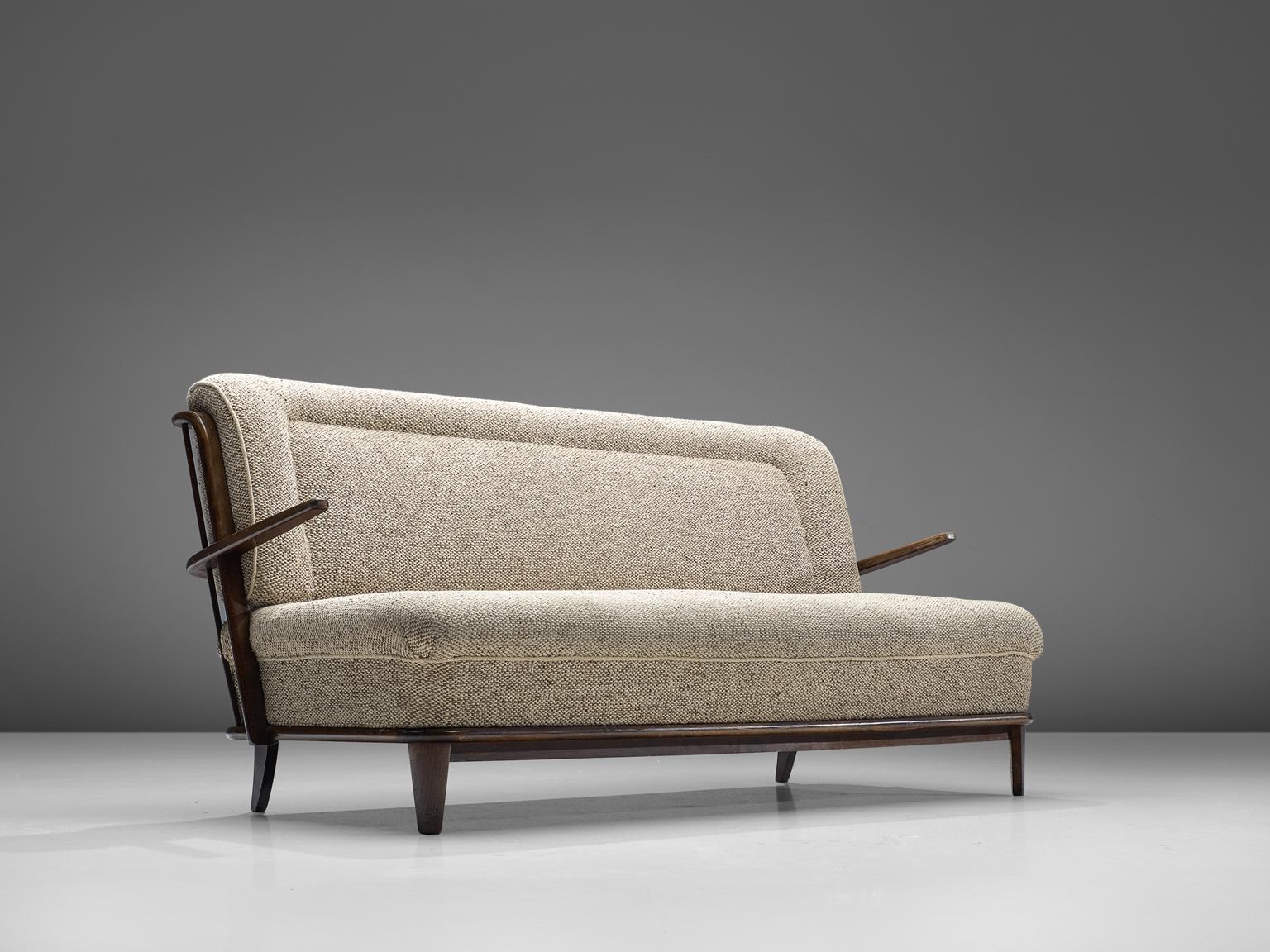 Sofa, fabric, wood, Denmark, 1950s

This small sofa has various interesting details that make sure this piece will stand out without being ostentatious. The piece is therefore very Danish in its design. The back of the sofa shows vertical slats and