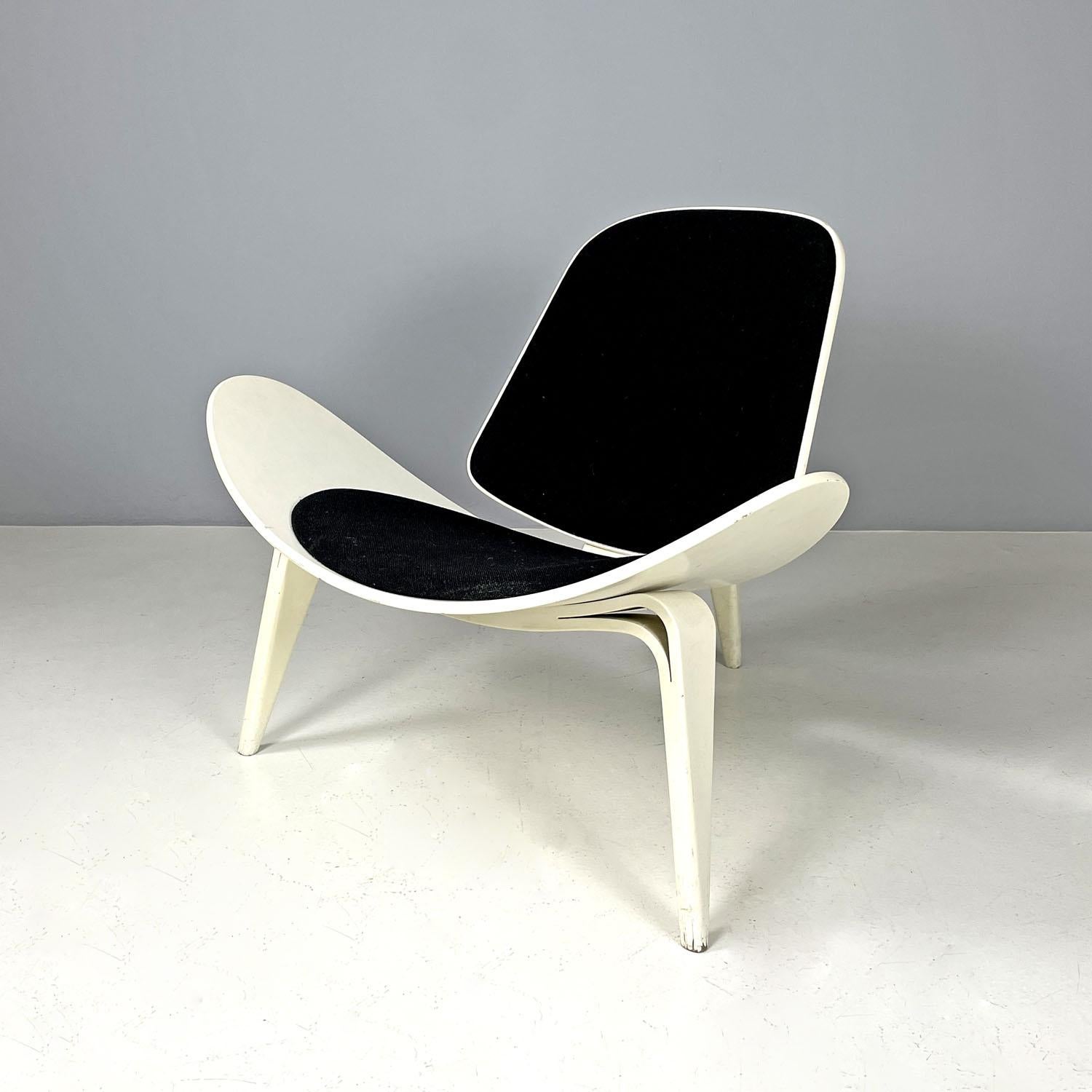 Danish wooden shell armchair CH07 by Hans Wegner for Carl Hansen & Søn, 2000s
Shell armchair mod. CH07 Shell Chair with white lacquered wooden structure. The structure has particular dynamic and enveloping lines, the seat is elongated and the sides