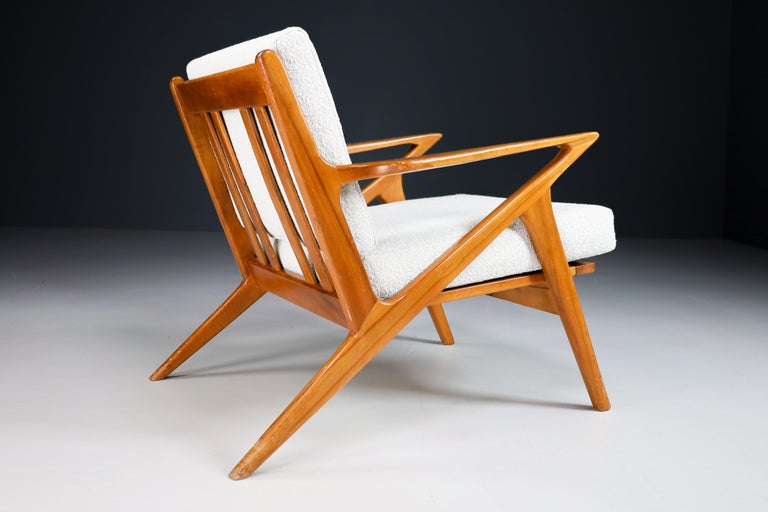 Danish modern lounge chair designed by Poul Jensen for Selig in Denmark, circa 1960s. Known as the “Z” chair for its exclusive armrests that connect to the legs and give the illusion of a letter Z. These chairs stand out for the fine details of the