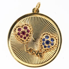 Dankner & Sons Vintage 14 Karat Gold Love Charm with Sapphire and Ruby Hearts