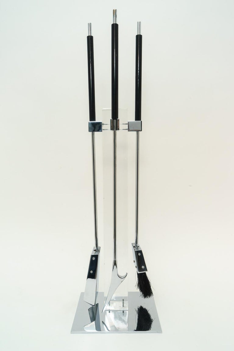 Chic fireplace tools in polished chrome and Lucite by Danny Alessandro NYC 1970s acquired from a Palm Beach estate.