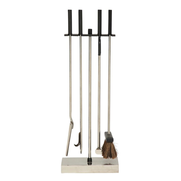 Danny Alessandro fireplace tools, matte black and nickel chrome. Quality built minimalist firetools with hexagonal handles and rectangular weighted stand. Mr. Alessandro's designs were sold through his Upper East Side Manhattan storefront.


   