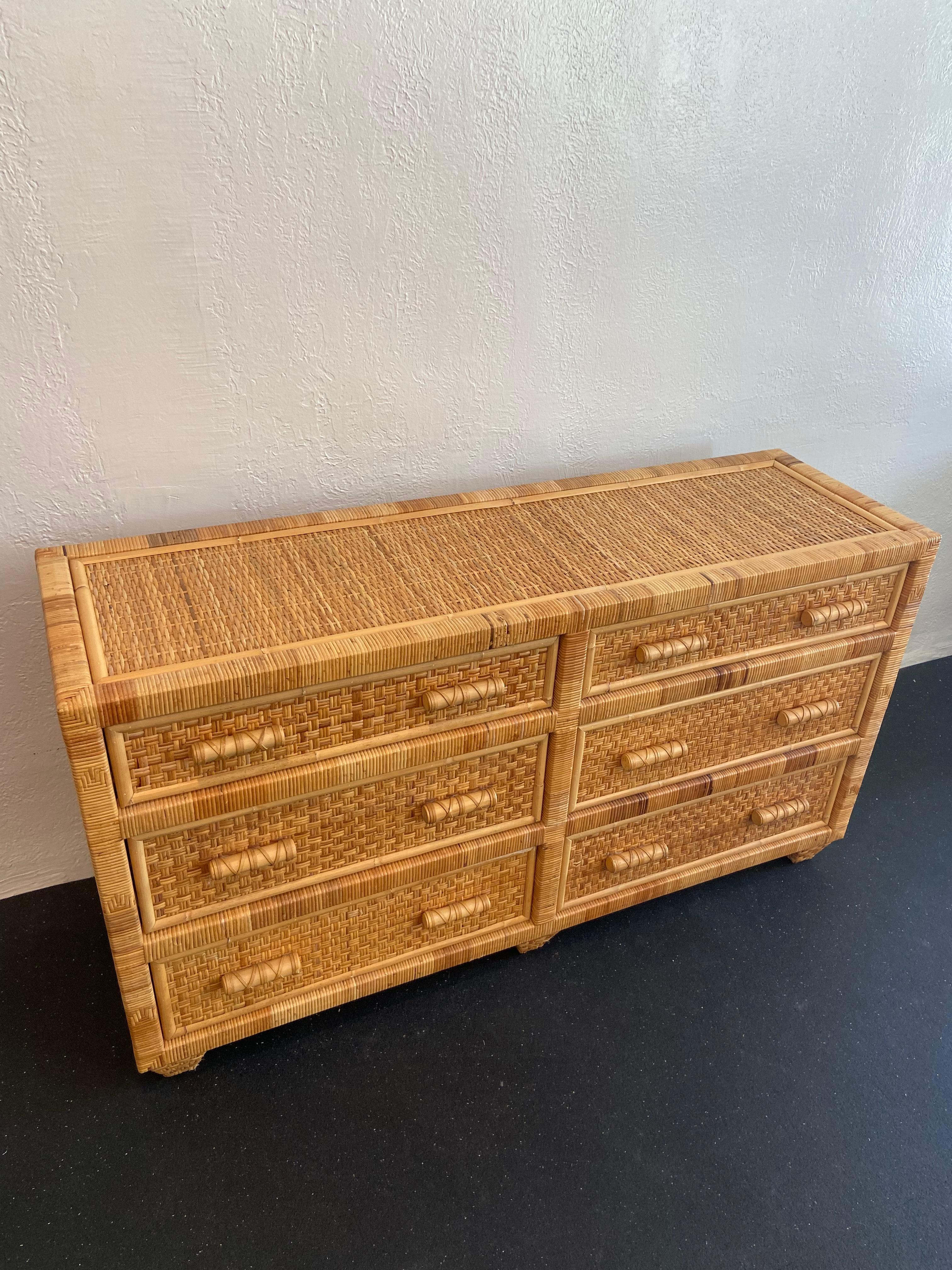 Danny Ho Fong style cane and leather wrapped dresser. Intricately woven cane reminiscent of Fong’s designs complimented with heavy leather wrapped pulls. 

Would work well in a variety of interiors such as modern, mid century modern, Hollywood