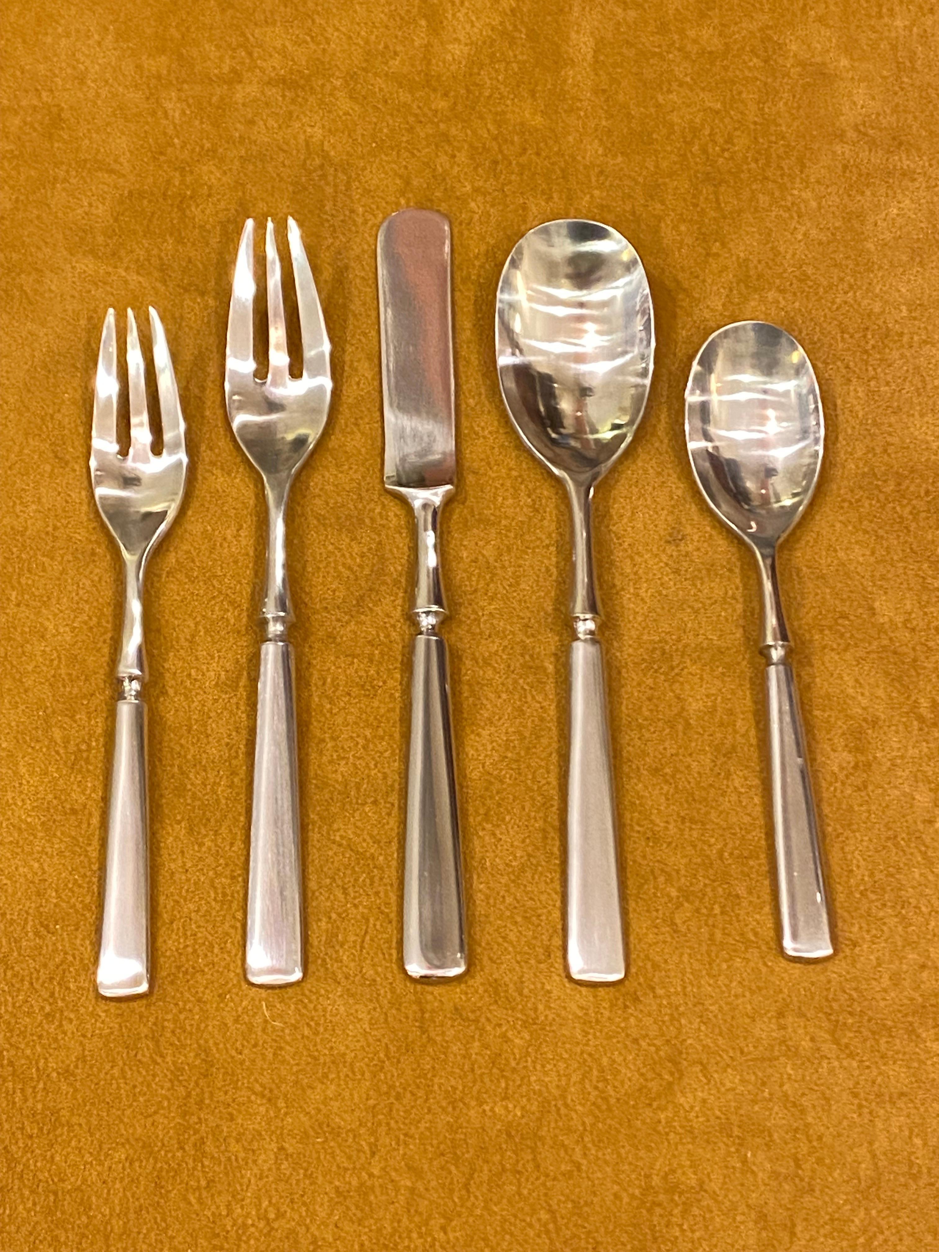 Dansk Service for 8 Stainless Steel Flatware Set.  Anvil Pattern 40 pieces all new and unused!  All in their original plastic sleeves!  Clean as a whistle!  Set is marked japan which dates the manufacture date to the 70's or 80's.