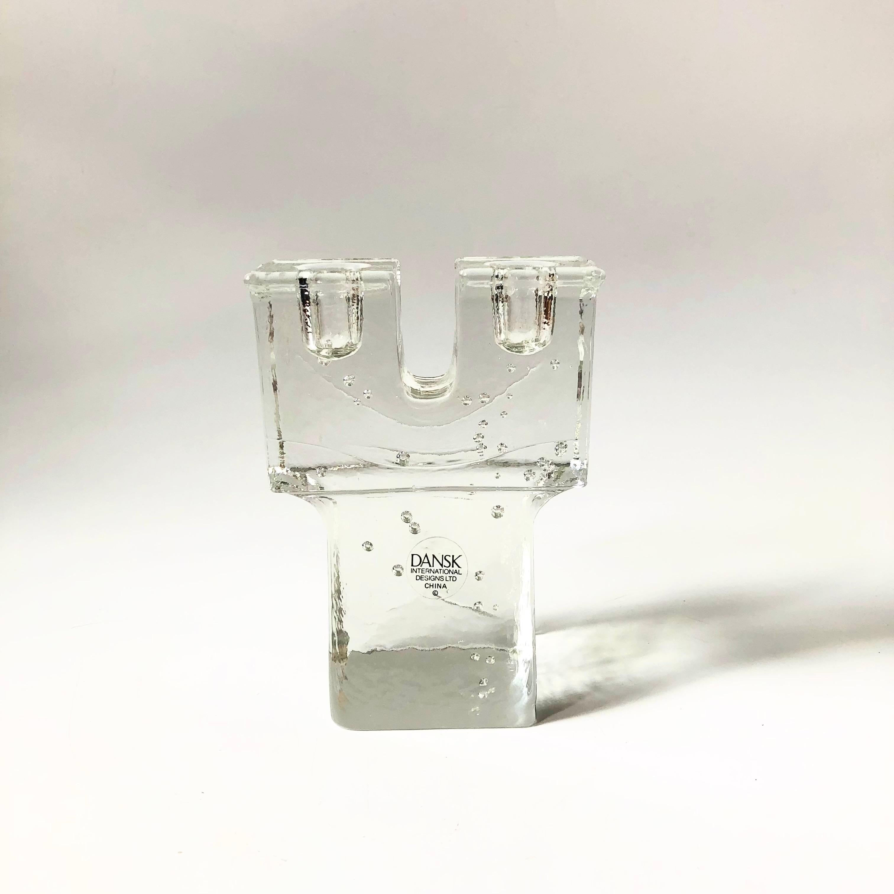 A vintage Dansk glass double candle holder. Nice blocky shape with little bubbles formed throughout the glass. Made in China by Dansk, most likely in the 1990s.


