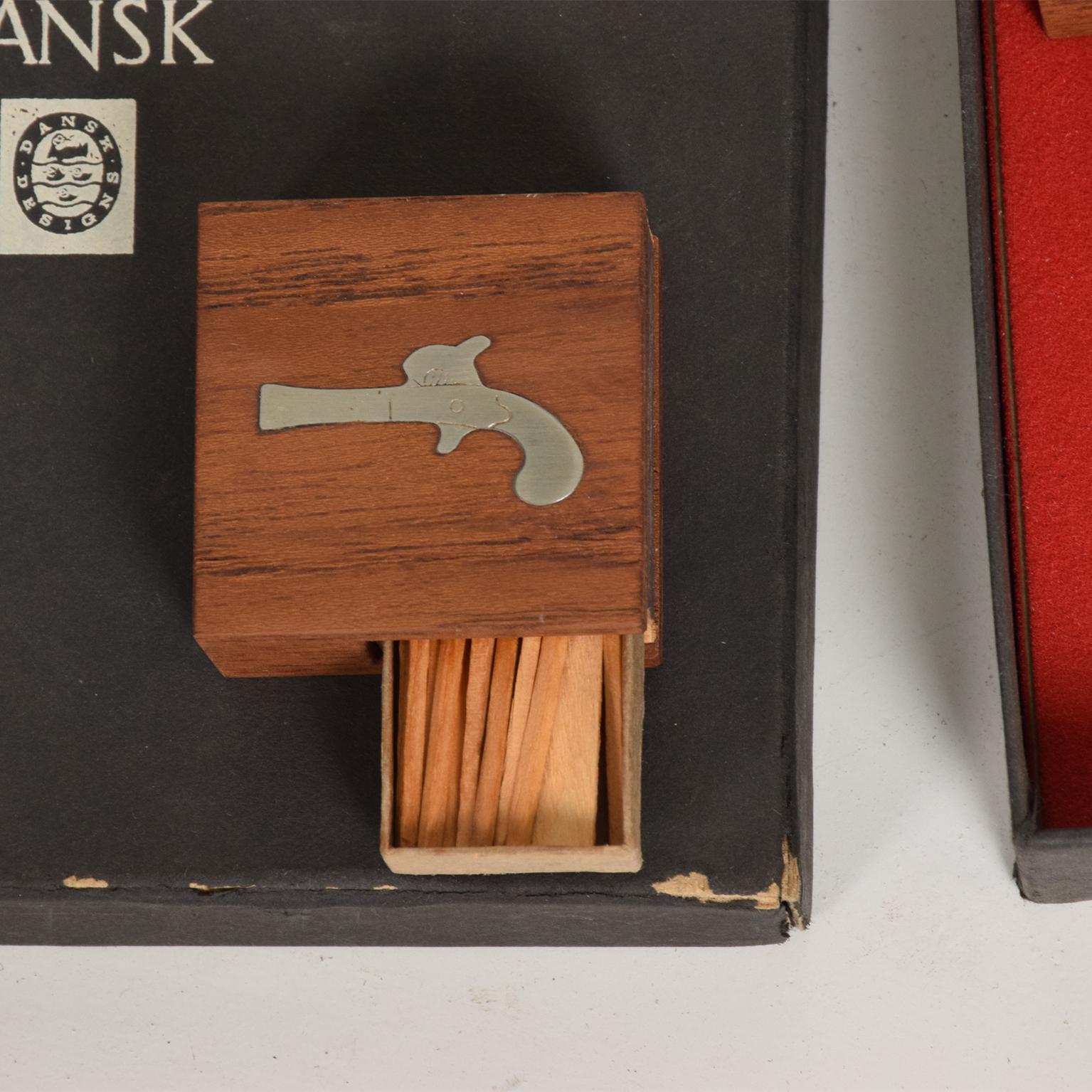 Fabulous collectible Dansk set of 4 match box holders in original packaging. Designed in Denmark 1960s by Jens Quistgaard JHQ
Made in teak wood and stainless steel
Each wooden box features a unique inlay decoration.
Dimensions: 1.75 x 1.75 x .75
