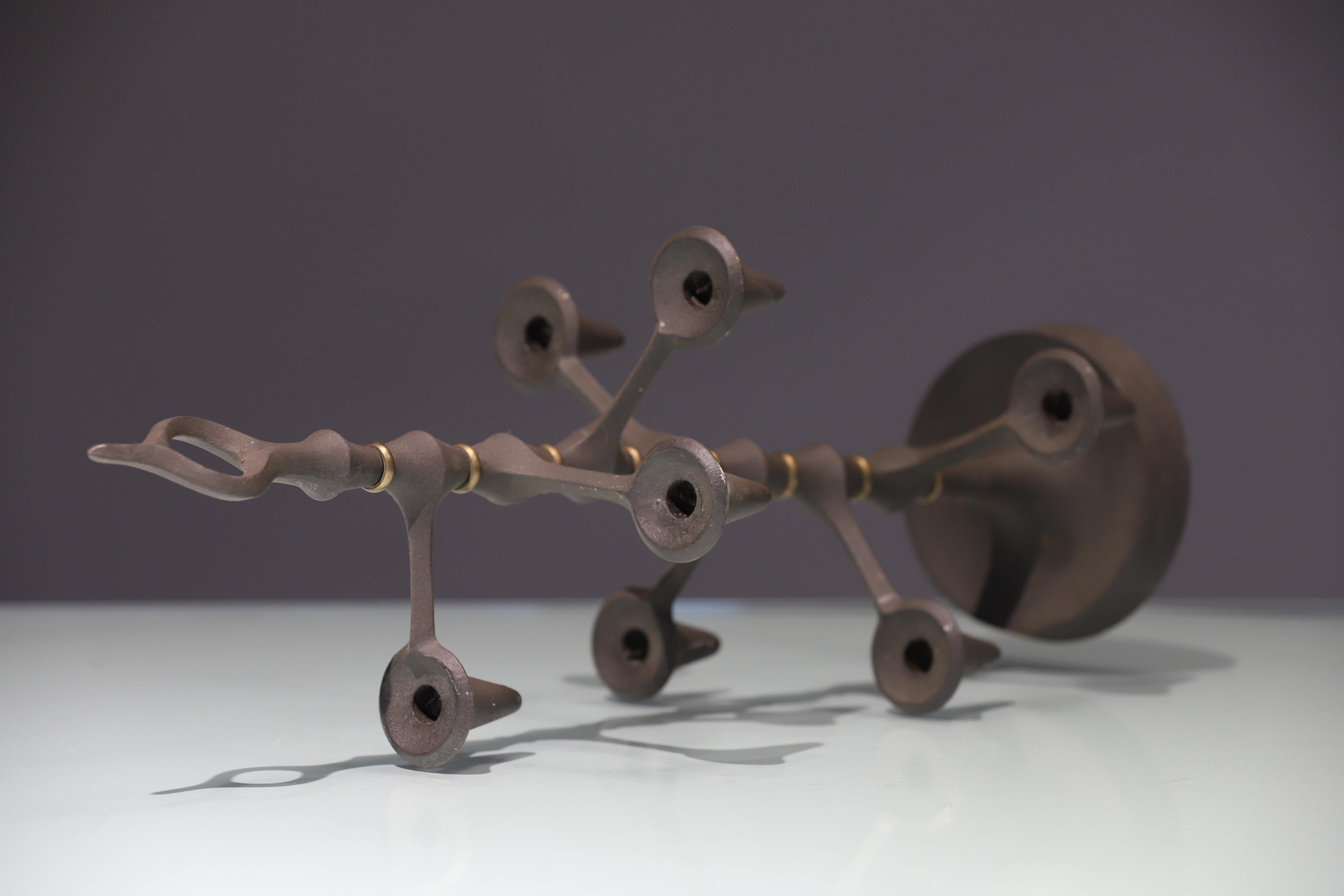 Wonderful Danish designed multi-head candleholder. Designed by Jens Quistgaard for Dansk. Candleholder heads can be adjusted horizontally in a spiral.