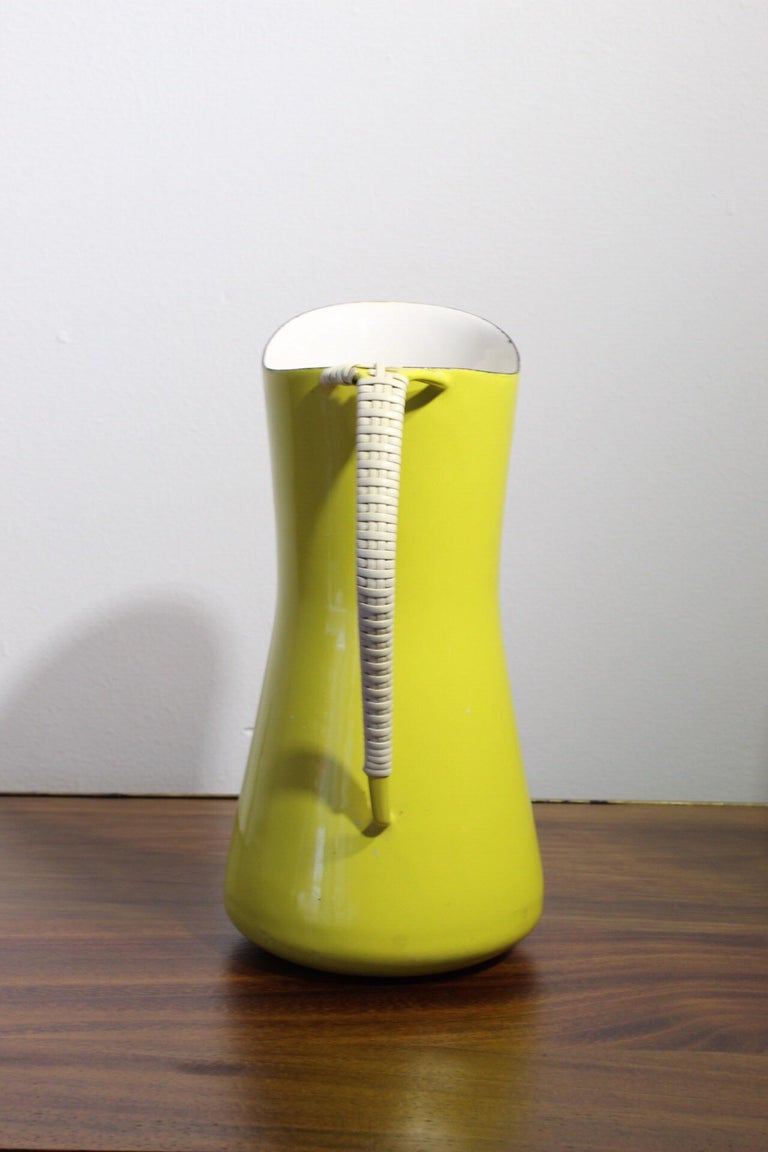 https://a.1stdibscdn.com/dansk-designs-denmark-yellow-enamel-pitcher-for-sale-picture-2/f_33303/1551915922234/mobilejpegupload_EE1AB905466C4EA5B0FAA6BCB60B93A4_master.jpg?width=768