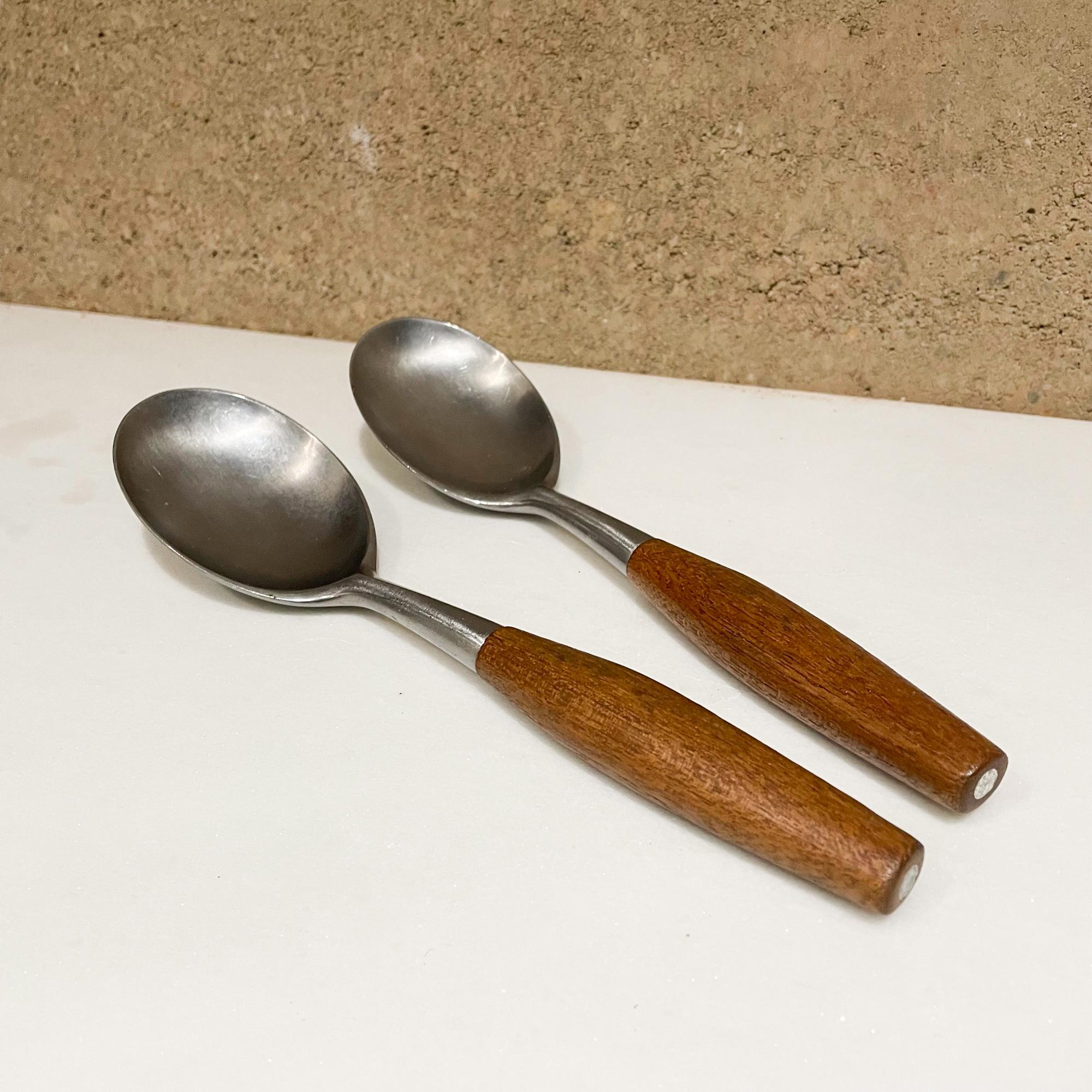 Two Large Spoons
Dansk IHQ Fjord Designs from Germany by Jens Quistgaard designed in 1954
Maker stamped.
Original unrestored preowned use vintage condition.. see all images please.
Designed in Teak Wood and Stainless Steel.
Measures: 9L x 2.38 W