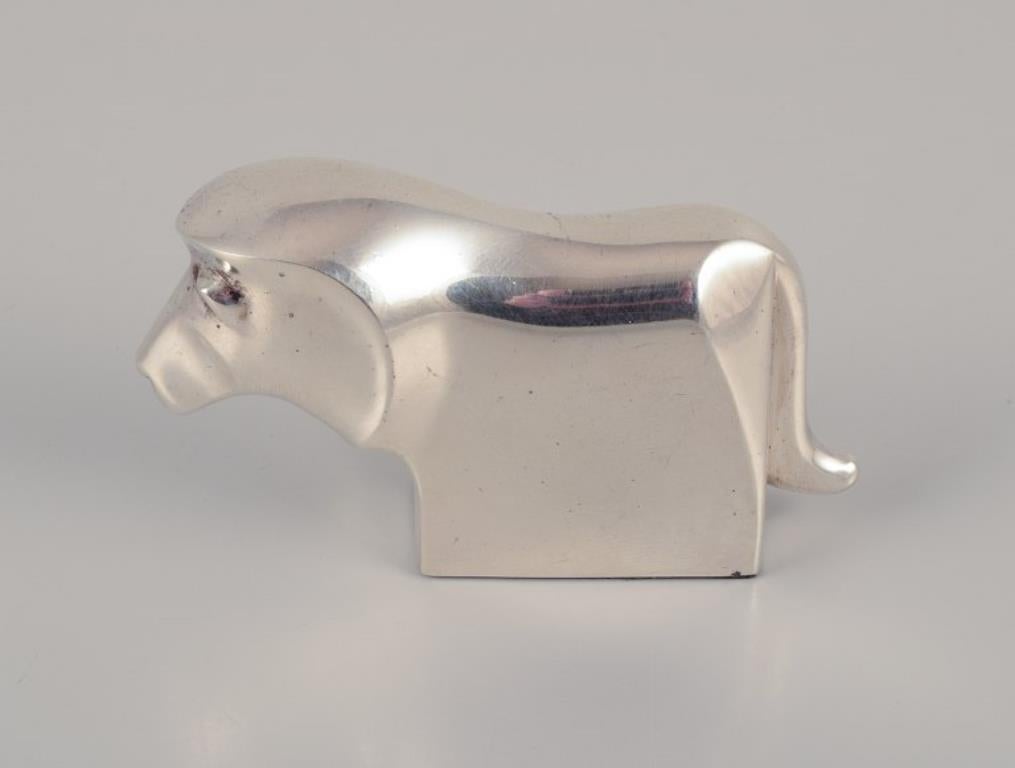Dansk International Designs Ltd.
Small sculpture in plated silver.
Rare sculpture, sold to Japan.
1970s.
Marked.
In excellent condition.
Dimensions: L 7.0 cm x H 3.8 cm.