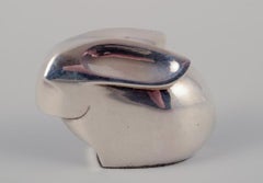 Dansk International Designs Ltd. Small sculpture of rabbit in plated silver.