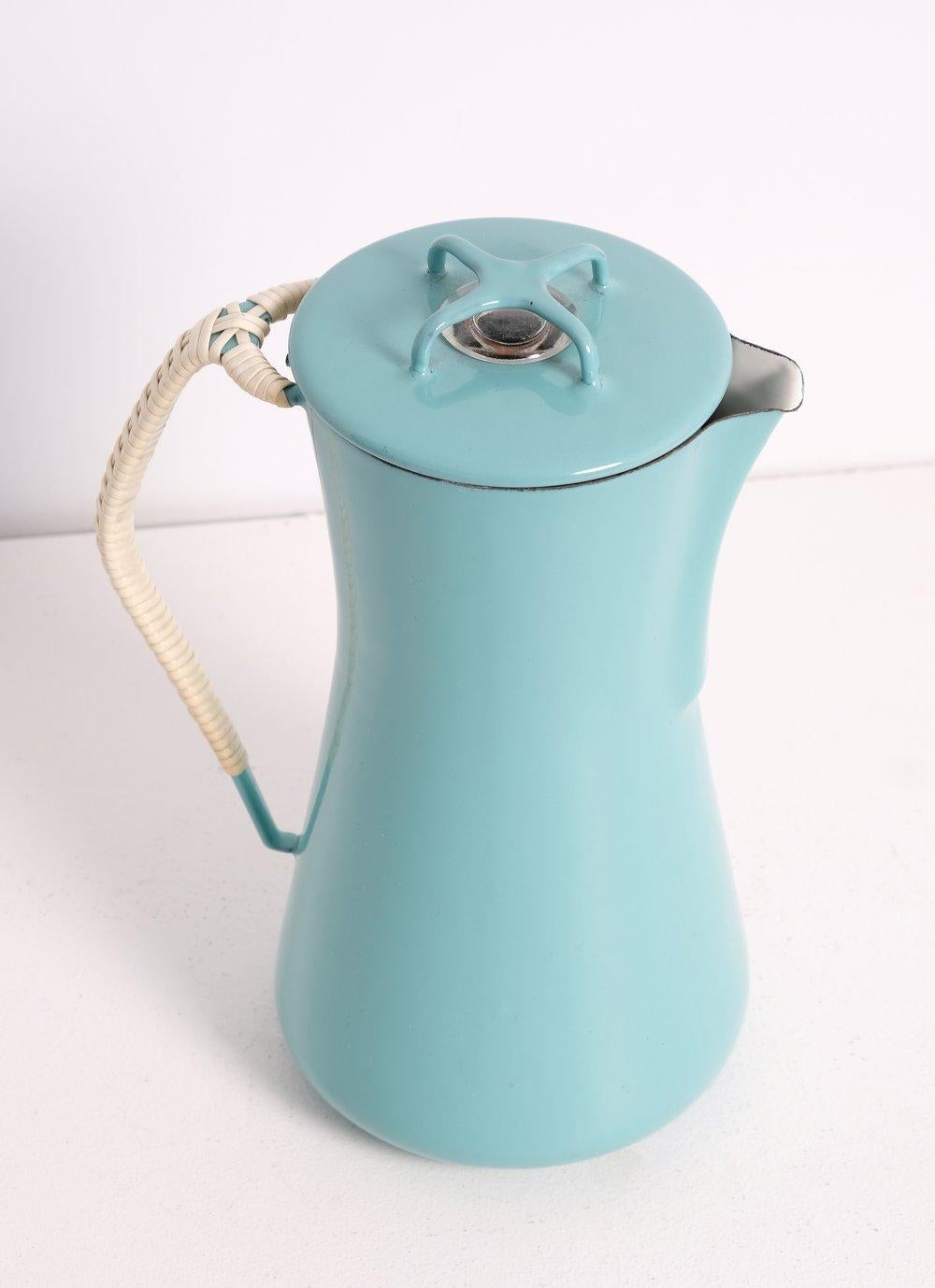 Near mint Dansk Kobenstyle IHQ turquoise/teal percolator designed by Jens Quistgaard, 1956, early 4 ducks logo produced in Denmark.

Near mint. Some tiny fleabites. Does not appear to have been used, in amazing condition.