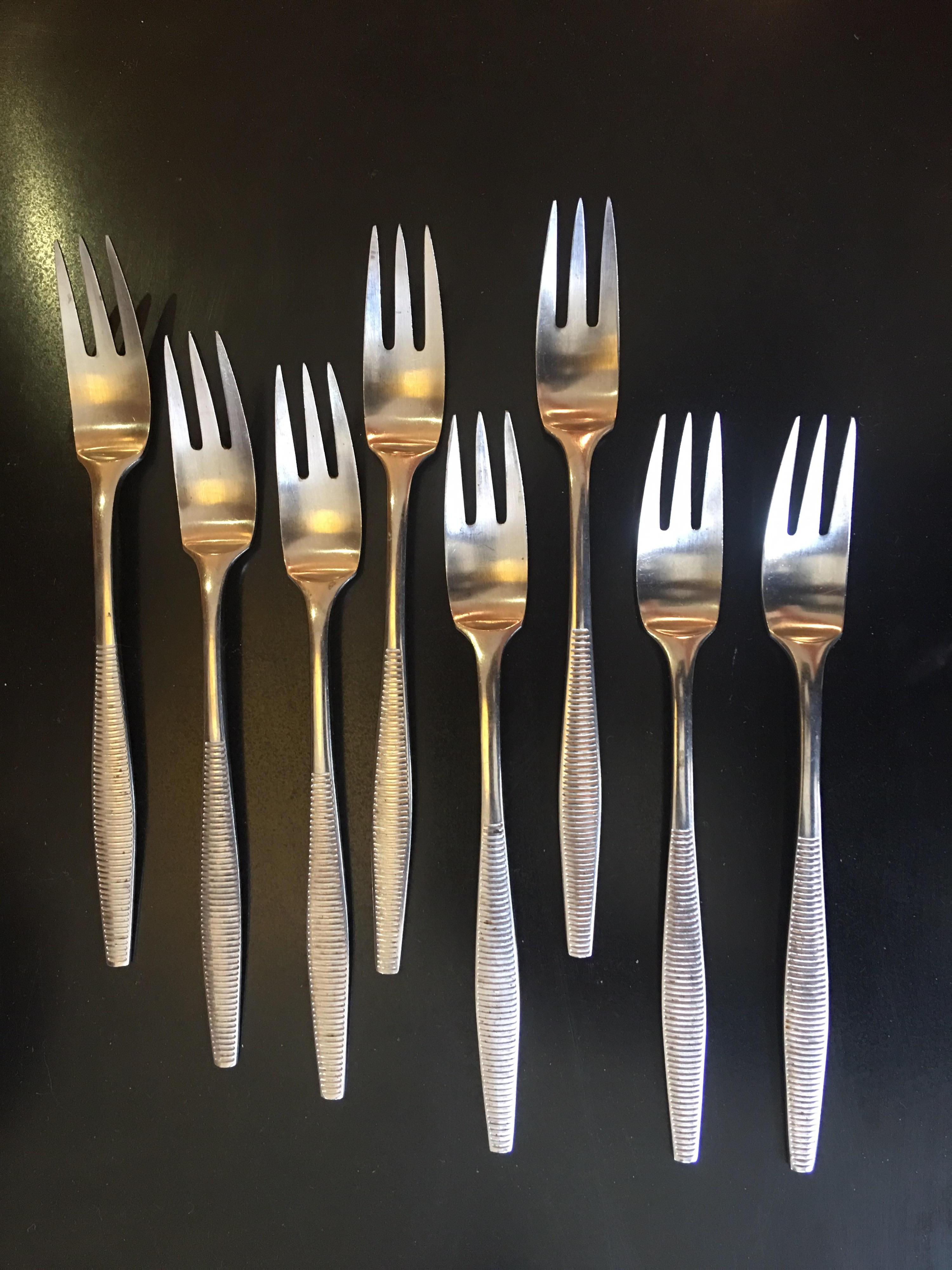 Hard to find Dansk variation 6 stainless flatware with a horizontal pattern of lines across each handle! 50 pieces, 6 pieces per place setting, all in nice condition, three teaspoons show slight disposal wear! Two serving pieces included.