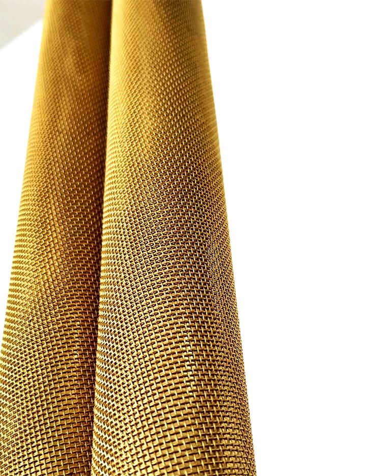Solid brass tubes seamlessly wrapped with brass mesh. 
Finished and assembled by hand. Original brass assembling technique developed by CANDAS DESIGN artisans.
Seized to order.

Lamping: 3 x E14

Measures: W12 cm / H56 cm. Other dimensions and