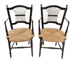 Dante Rossetti for Morris and Co. A pair of rush seated armchairs