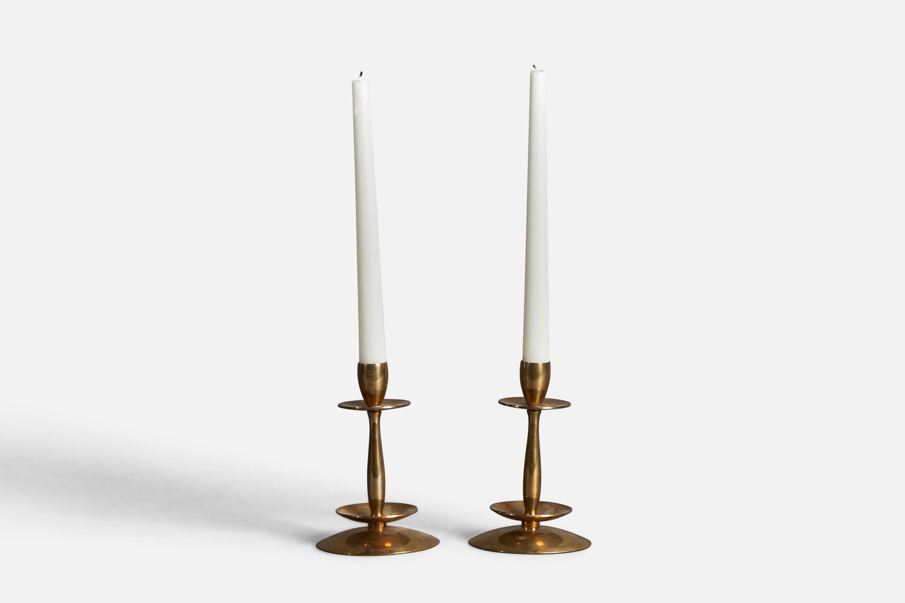 A pair of brass candlesticks designed and produced by Dantorp Design, Denmark, c. 1960s.