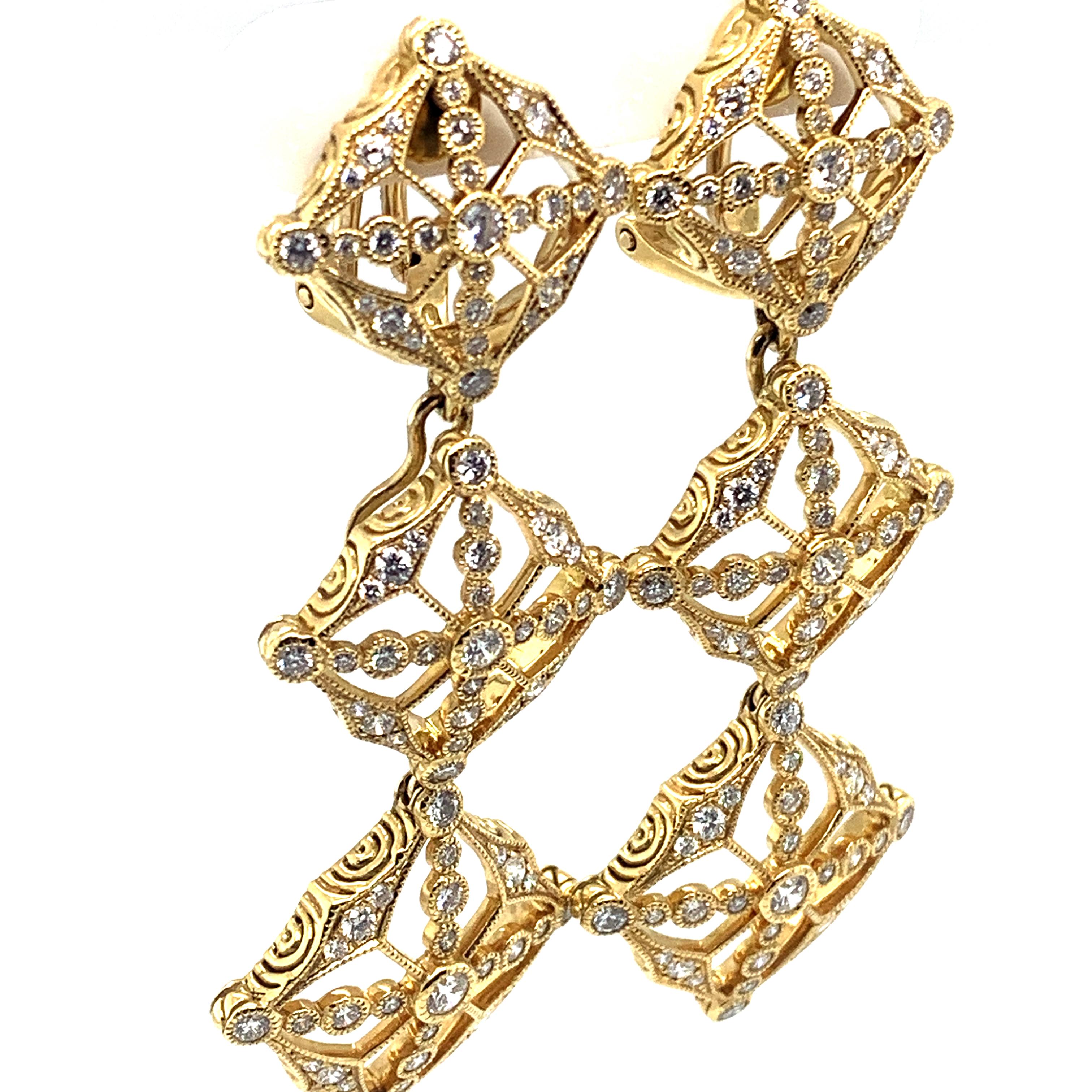 Danuta sexy dangling detachable gold earrings limited addition set in 18 karat yellow gold set with
2.27 carat in diamonds FG color VS clarity. Top is detachable and can be worn as a stud earrings.
Light and airy.
