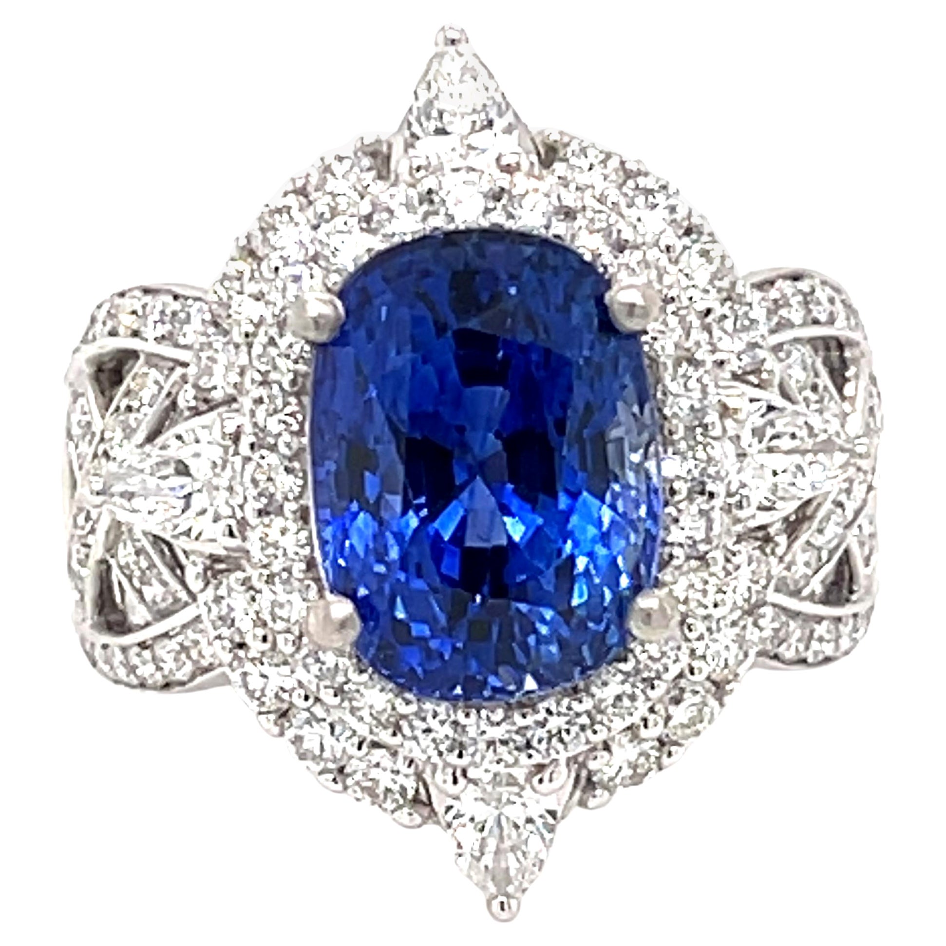 Danuta Oval Blue Sapphire 7.5 Carat and Diamond Platinum Engagement Ring For Sale