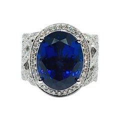 18 Karat Gold 14.66 Carat Tanzanite 
2.34 Carat Diamonds Ring