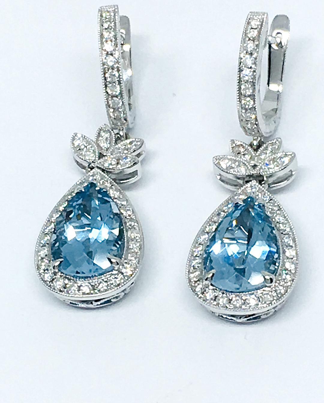 18k White Gold 
2 Aquamarine 4.96 Total Carat Weight 
84 Diamond 0.85 Total Carat Weight 
Color F
Clarity VS2
1.5