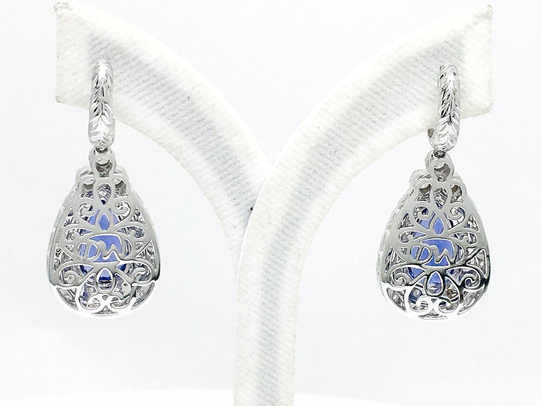 Art Nouveau 18 Karat Gold 8.22 Carat AAAA Color Tanzanite and Diamond Earrings For Sale